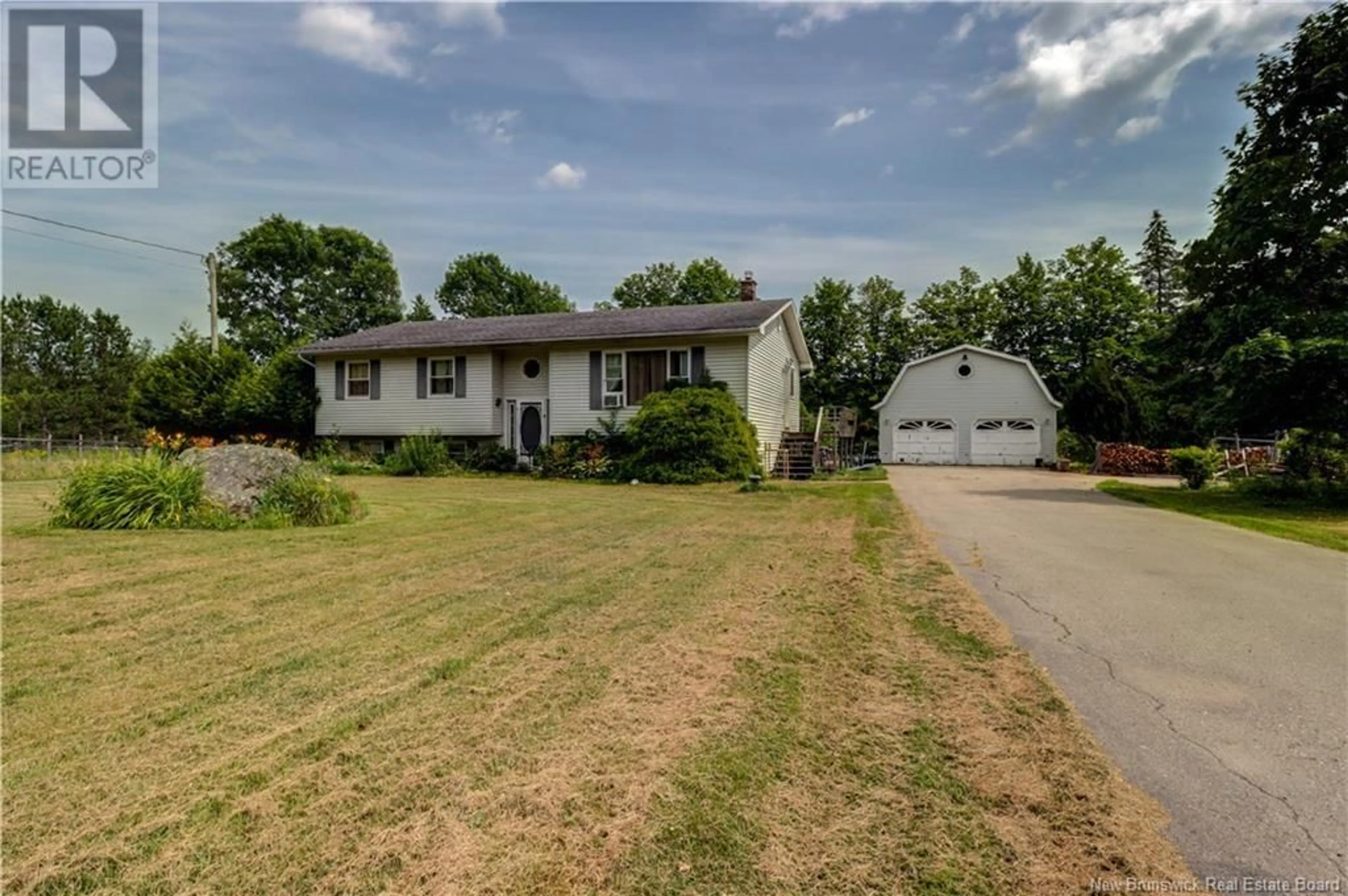 A pic from outside/outdoor area/front of a property/back of a property/a pic from drone, street for 1911 ROUTE 870, Springfield New Brunswick E5T2H9