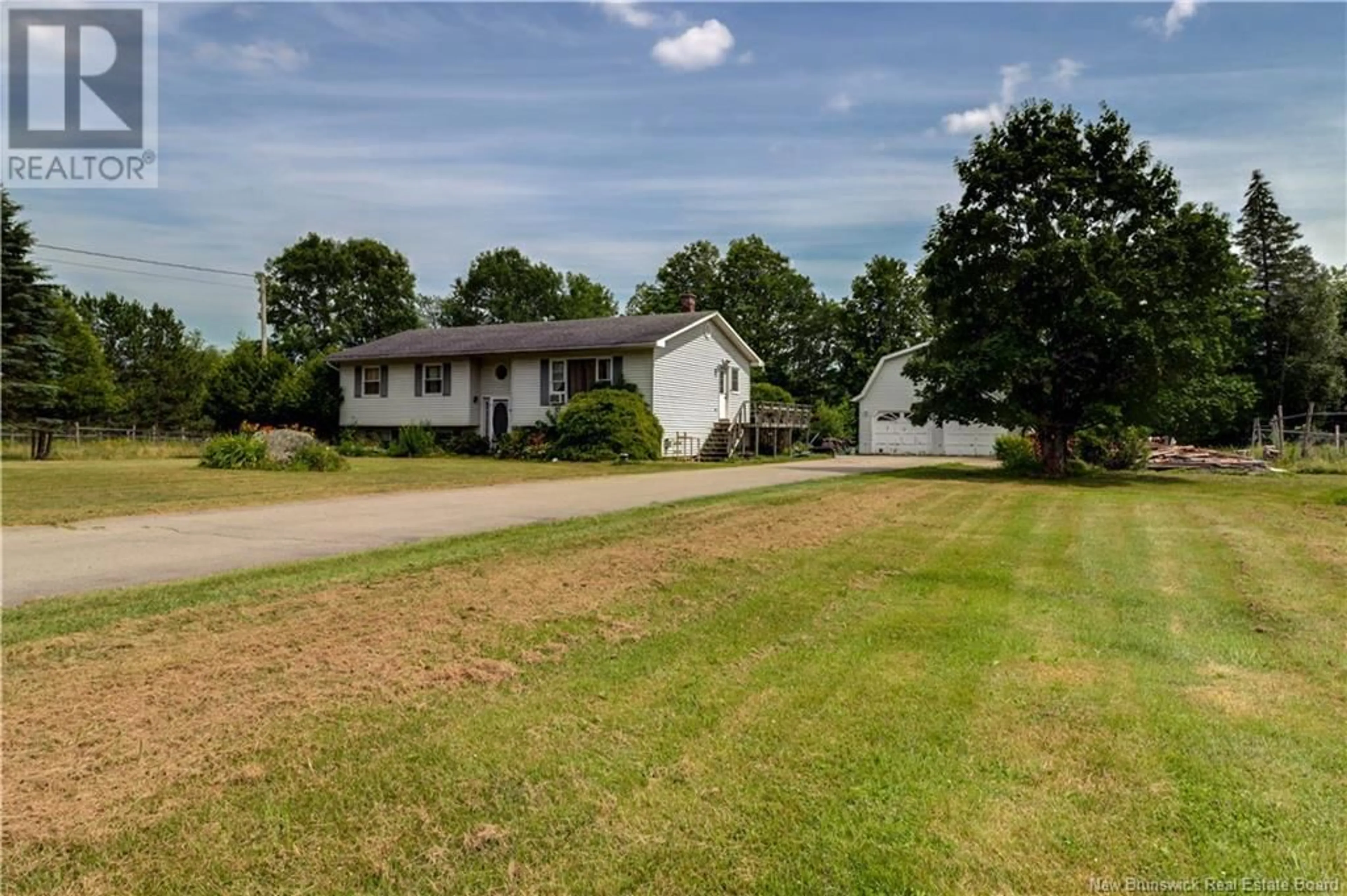 A pic from outside/outdoor area/front of a property/back of a property/a pic from drone, unknown for 1911 ROUTE 870, Springfield New Brunswick E5T2H9