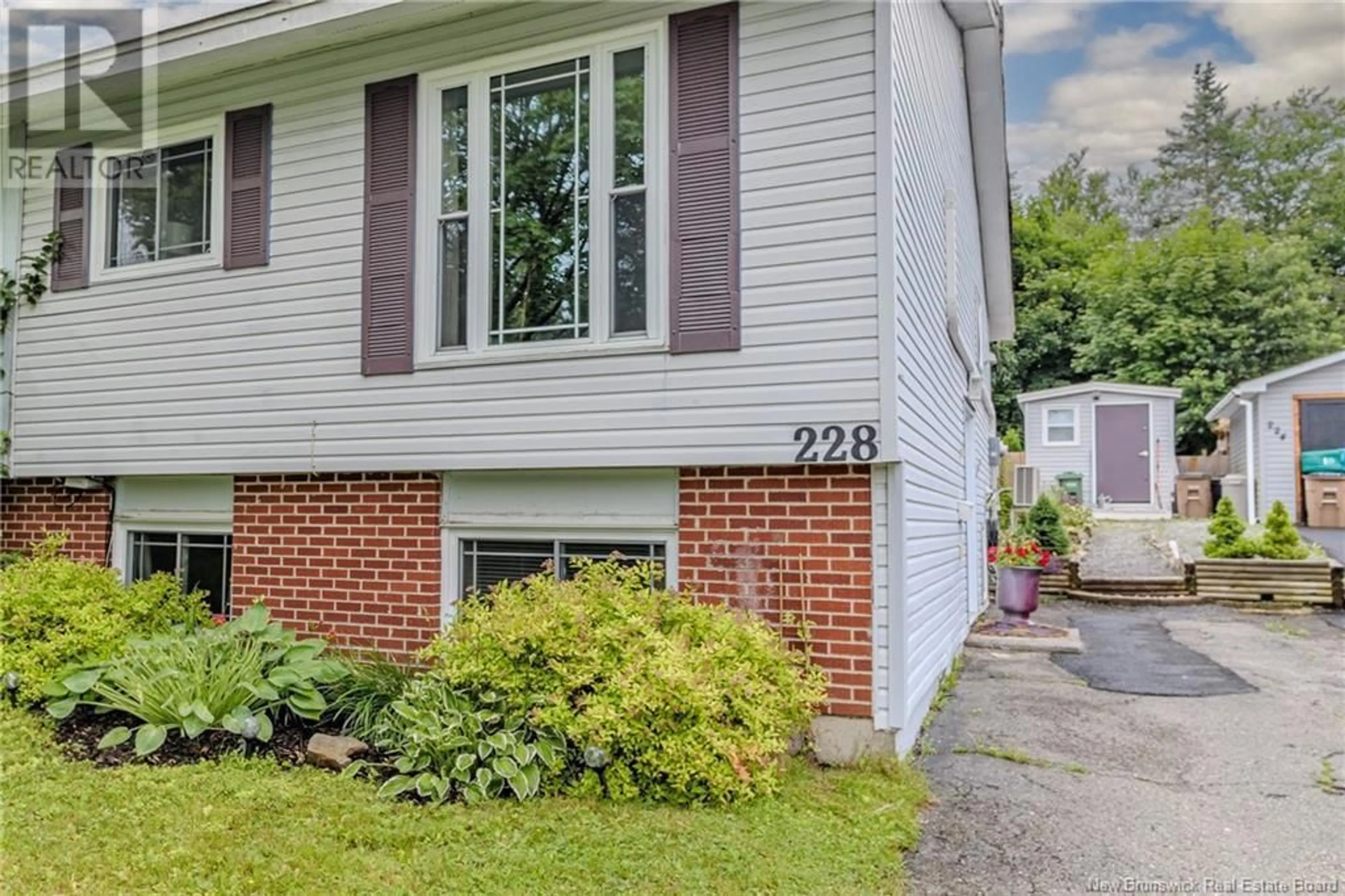Home with vinyl exterior material, street for 228 BOYANER CRESCENT, Saint John New Brunswick E2J4C7