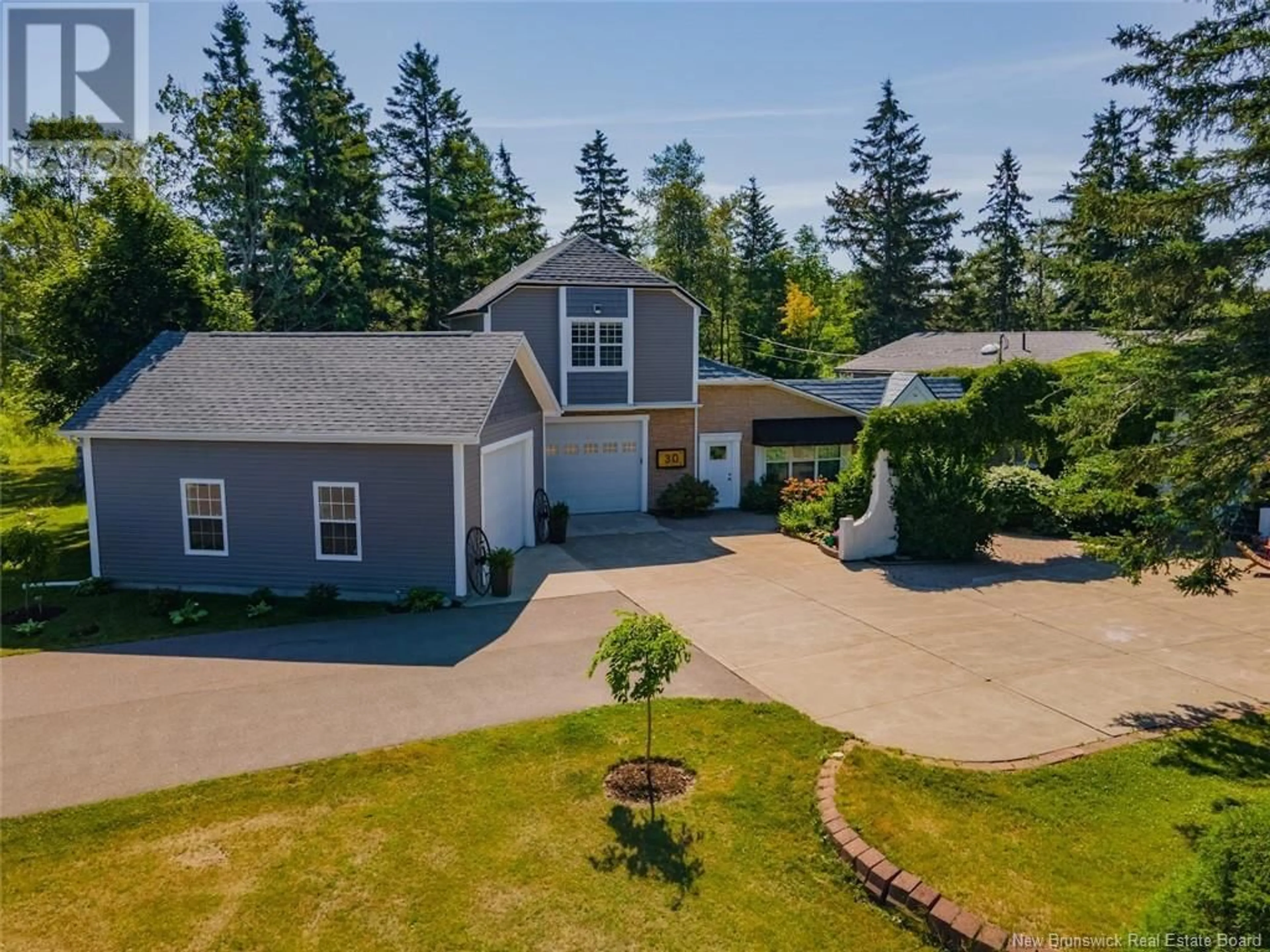 A pic from outside/outdoor area/front of a property/back of a property/a pic from drone, unknown for 30 DOIRON, Grand-Barachois New Brunswick E4P7K1