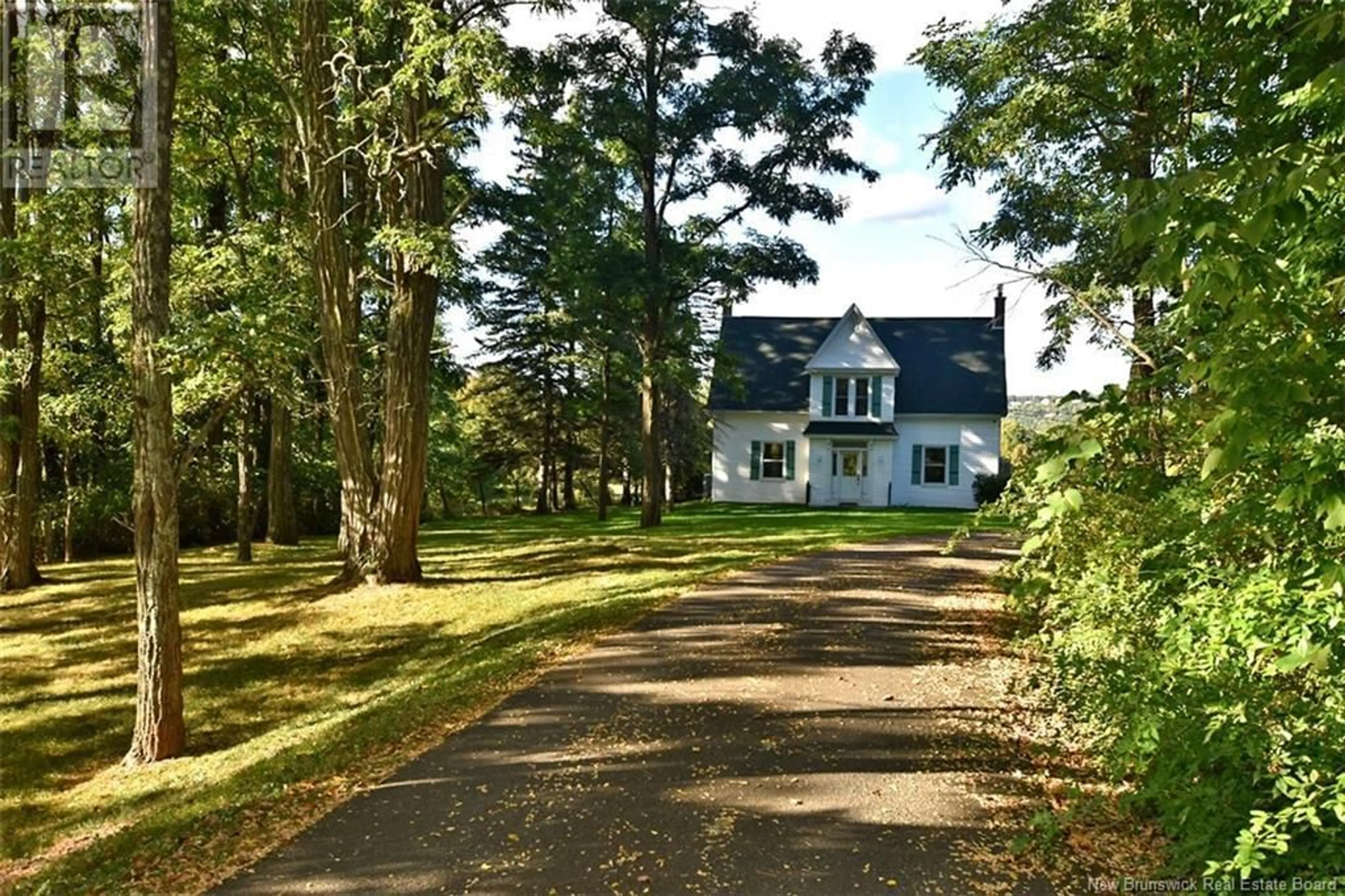 A pic from outside/outdoor area/front of a property/back of a property/a pic from drone, street for 3175 WOODSTOCK ROAD, Fredericton New Brunswick E3C1R2