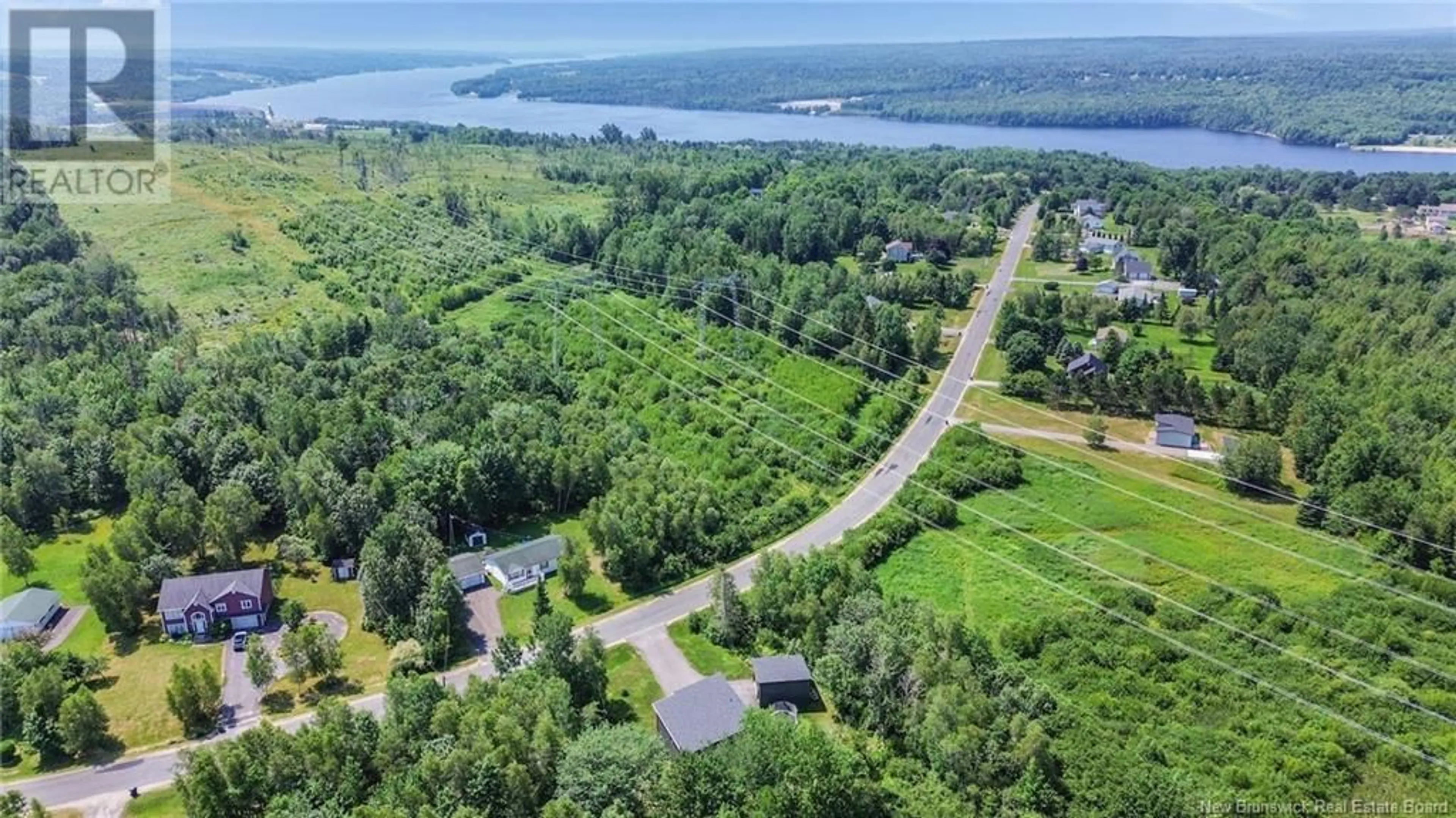A pic from outside/outdoor area/front of a property/back of a property/a pic from drone, water/lake/river/ocean view for 20 APPLE LANE, Keswick Ridge New Brunswick E6L1P6