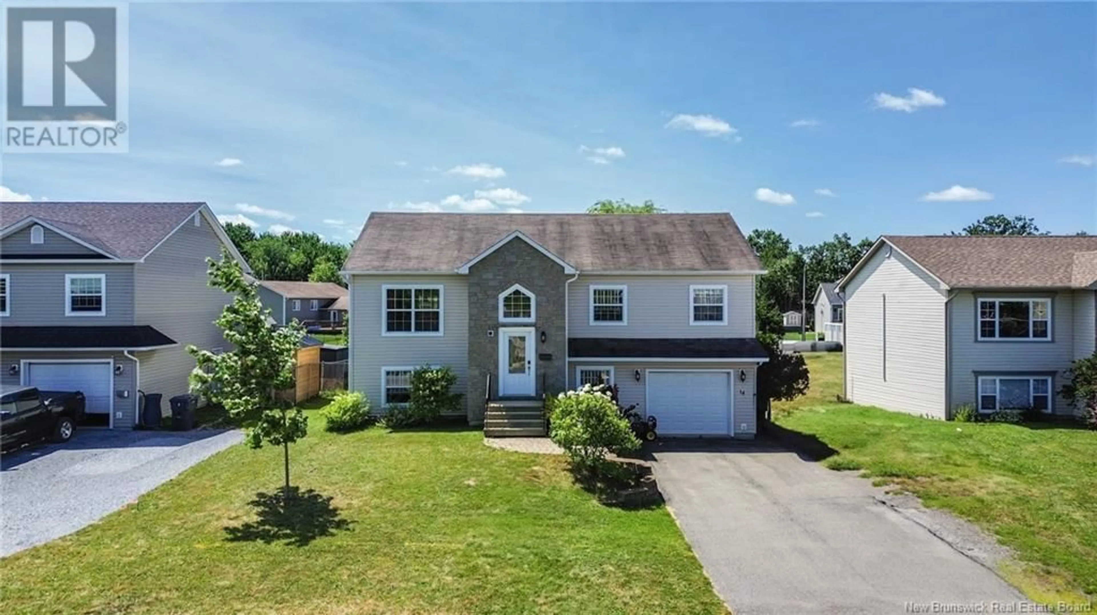 Home with vinyl exterior material, street for 14 HALLIHAN DRIVE, Oromocto New Brunswick E2V0C5