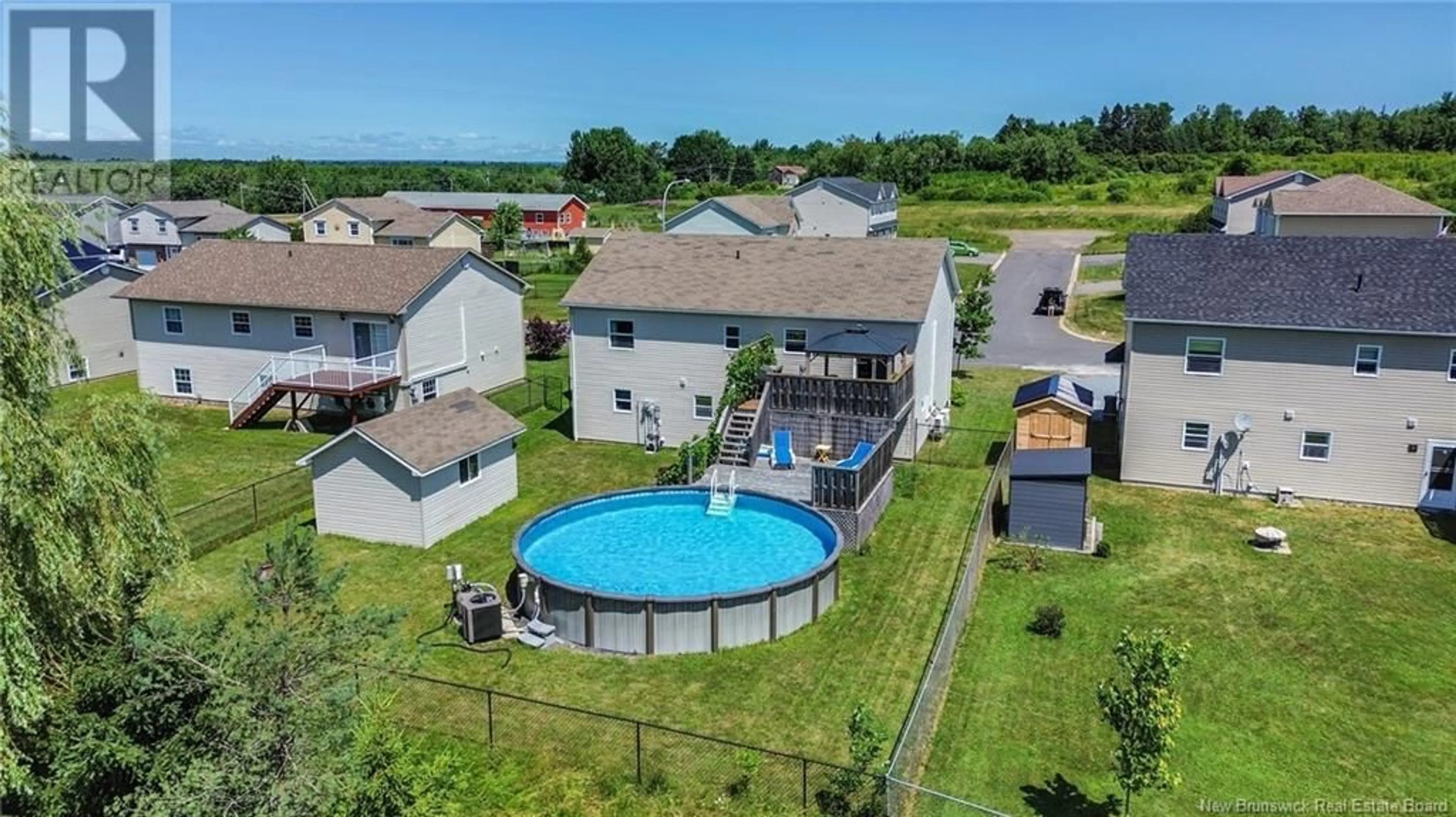 A pic from outside/outdoor area/front of a property/back of a property/a pic from drone, water/lake/river/ocean view for 14 HALLIHAN DRIVE, Oromocto New Brunswick E2V0C5