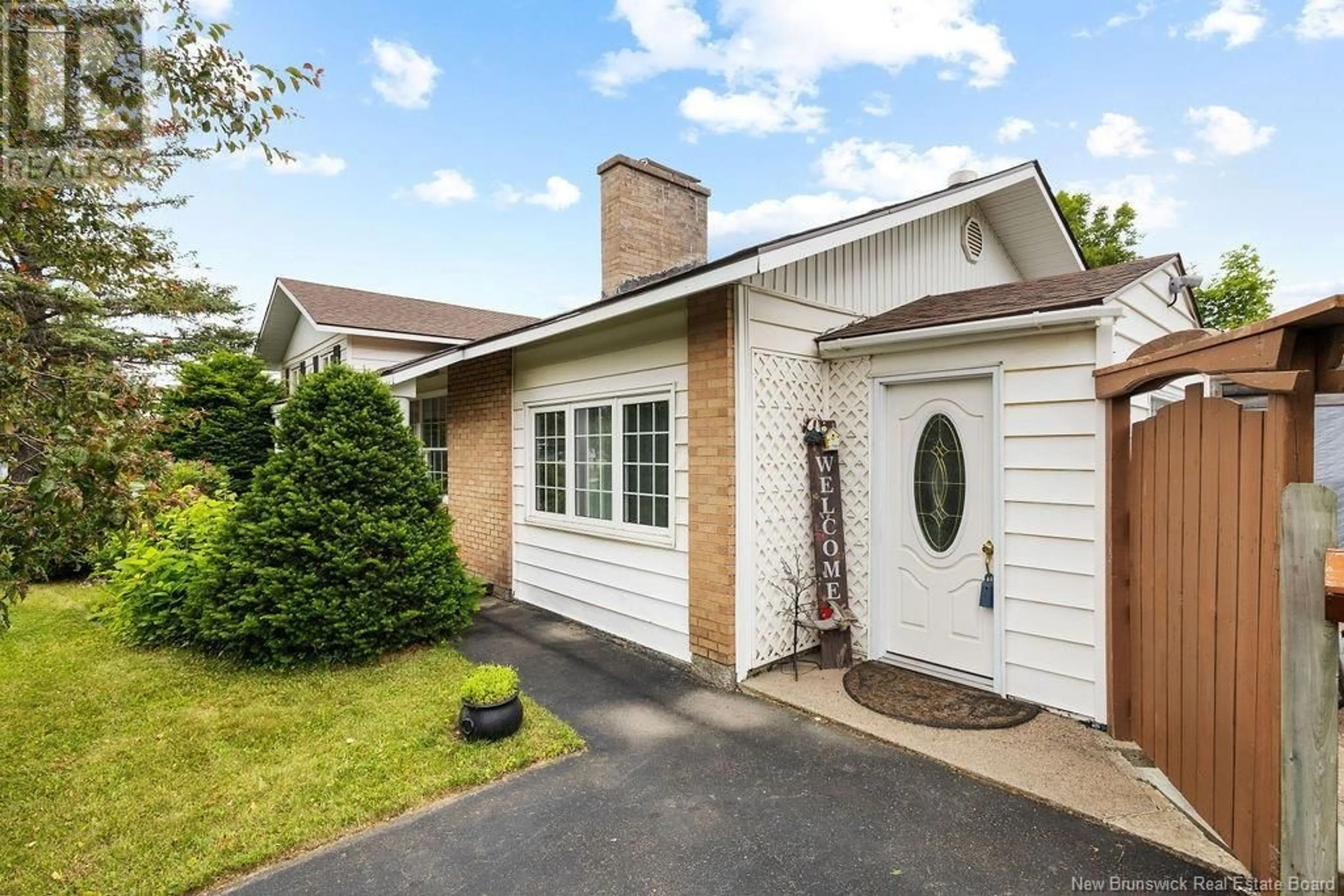 Home with vinyl exterior material, street for 97 UNIVERSITY AVENUE, Miramichi New Brunswick E1N2V6
