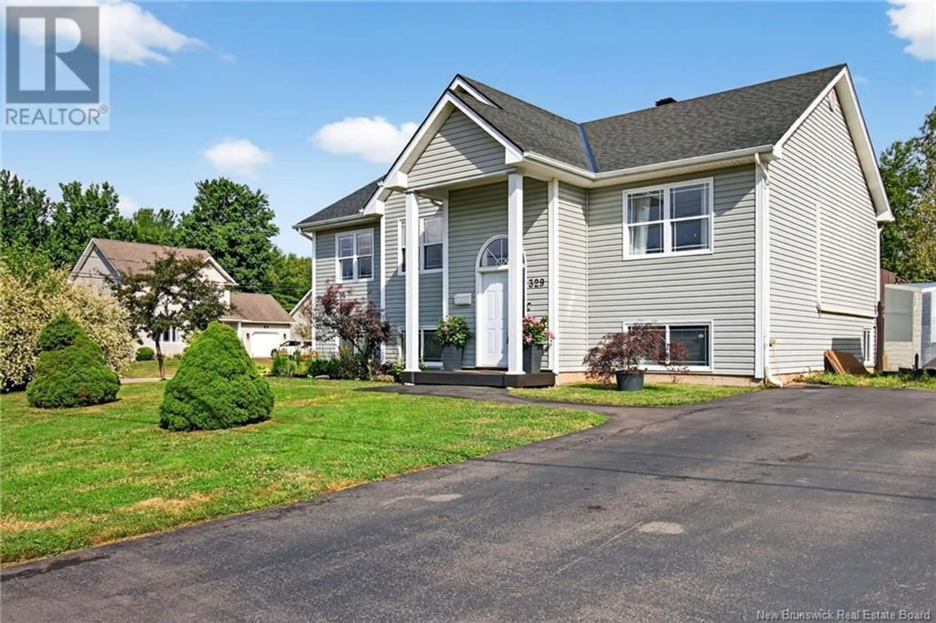 Home with vinyl exterior material, street for 329 ALFRED-LEGER STREET, Dieppe New Brunswick E1A8J2