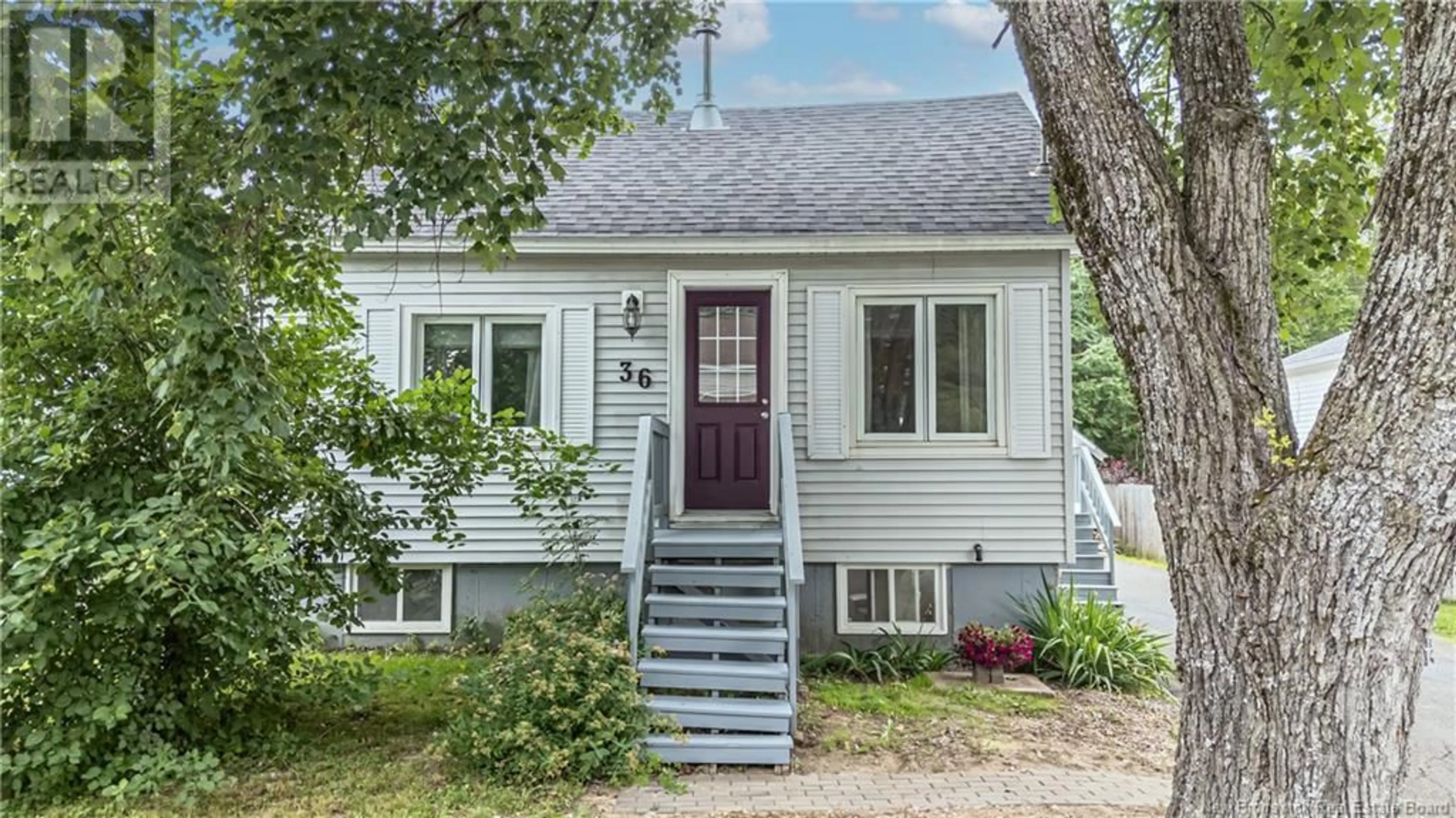 Home with vinyl exterior material, street for 36 MURRAY AVENUE, Fredericton New Brunswick E3A3V5