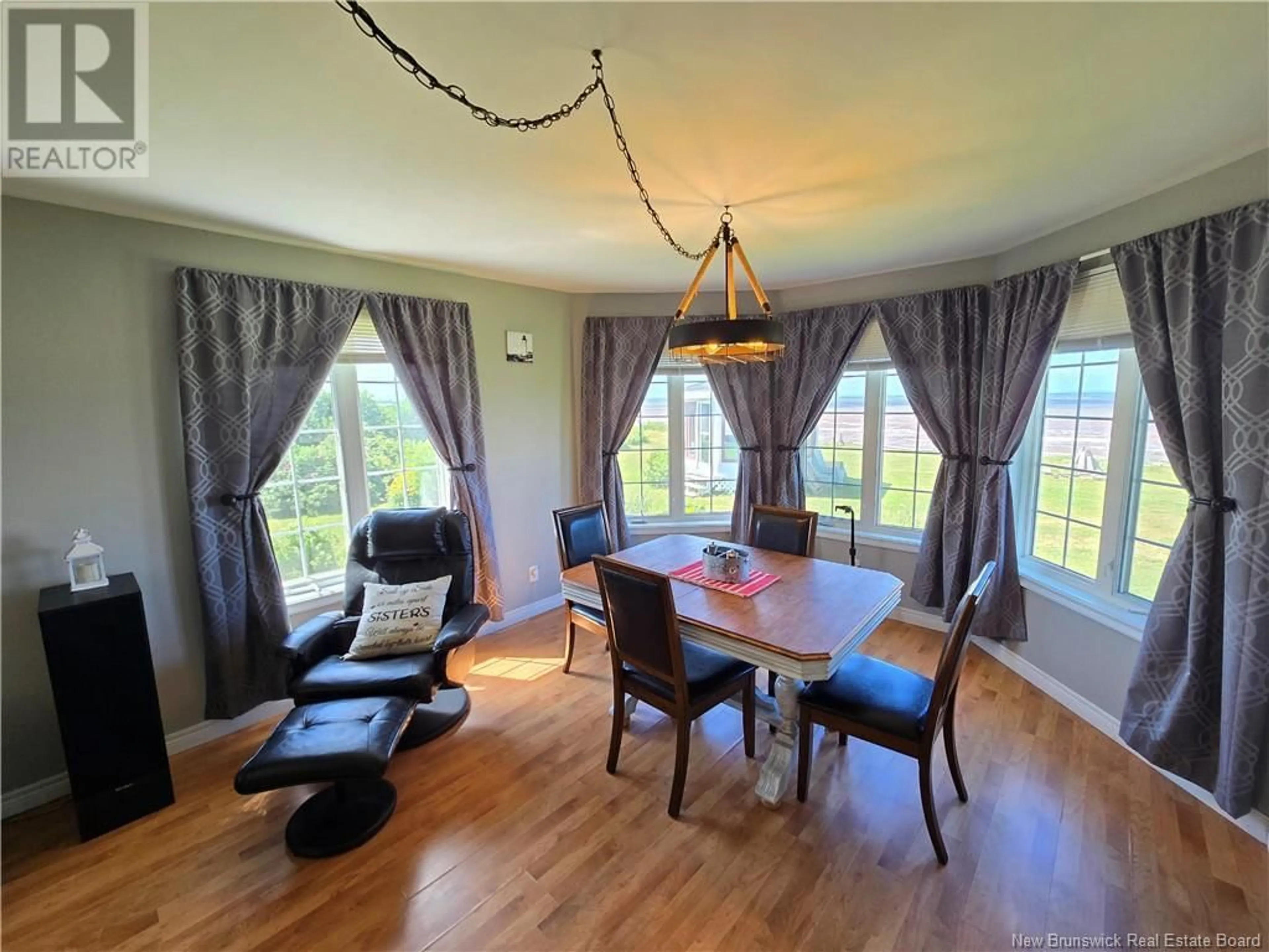 Dining room, wood/laminate floor for 49 OCEAN WALK DRIVE, Salmon Beach New Brunswick E2A6C7