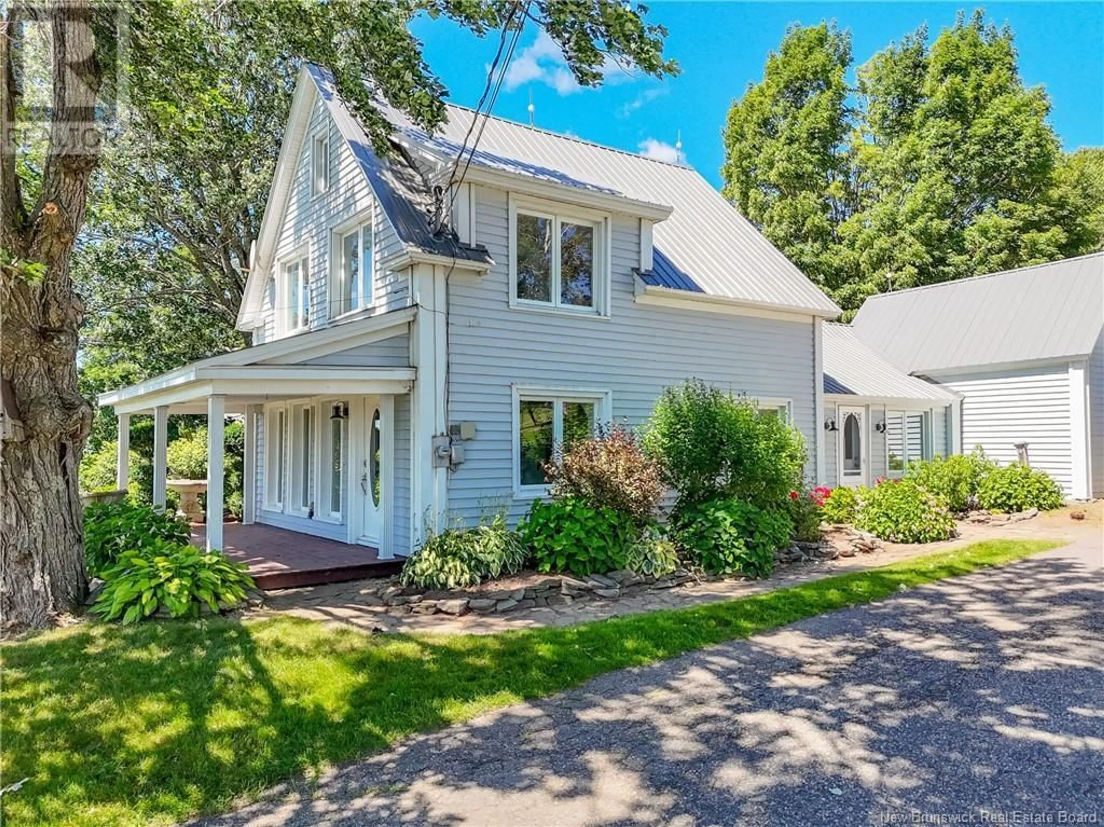 A pic from outside/outdoor area/front of a property/back of a property/a pic from drone, street for 1152 ROUTE 105, Douglas New Brunswick E3A7J9