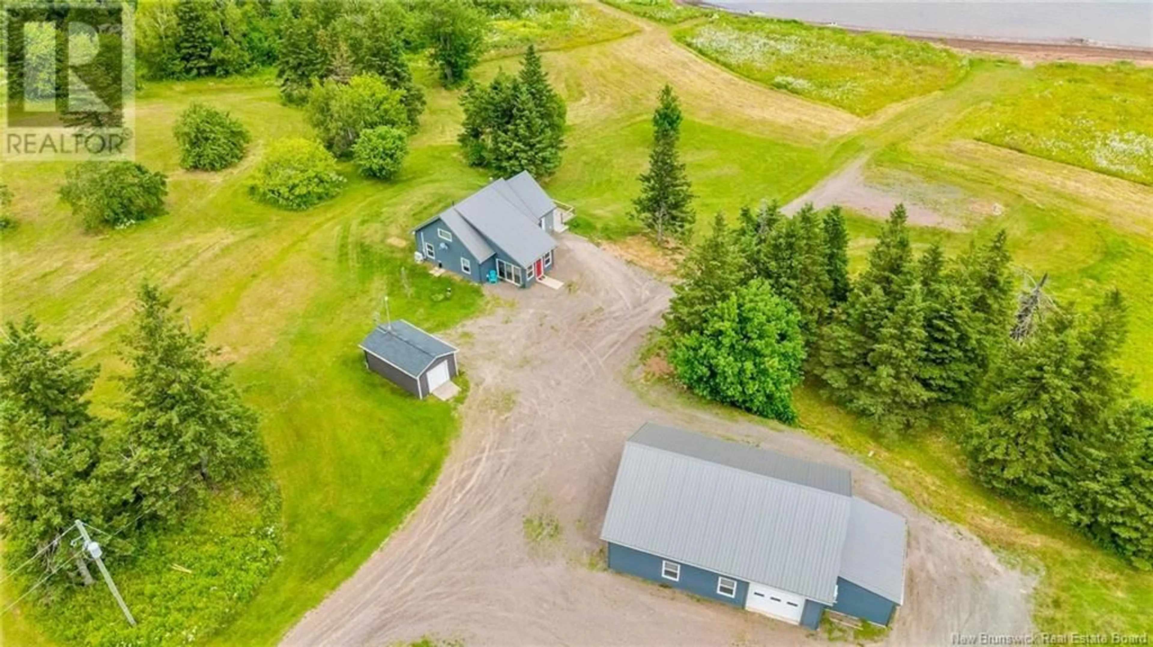 A pic from outside/outdoor area/front of a property/back of a property/a pic from drone, building for 279 JOHNSON POINT ROAD, Johnston Point New Brunswick E4M1P3