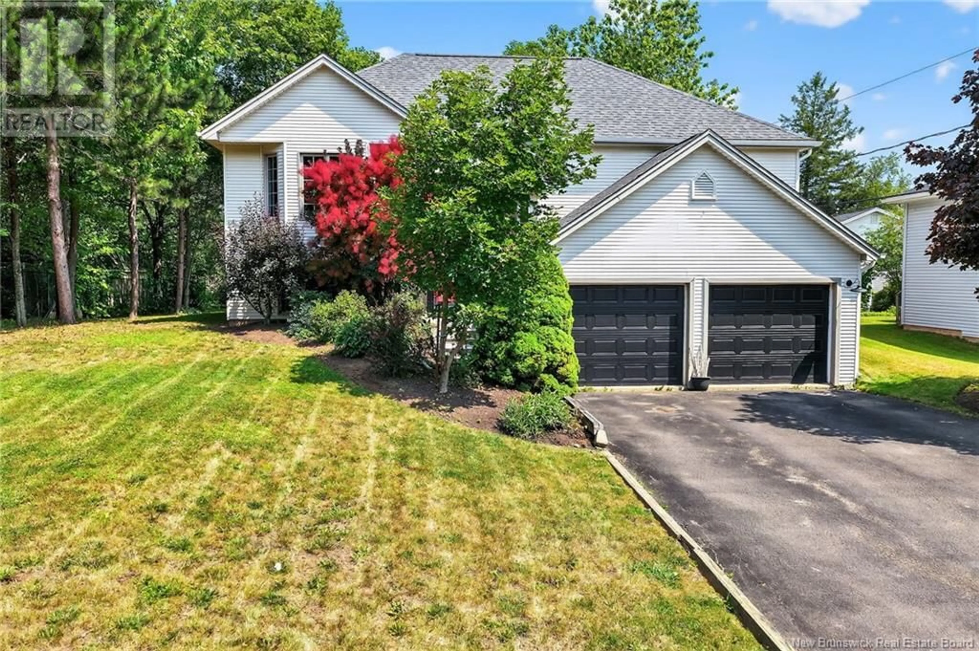 A pic from outside/outdoor area/front of a property/back of a property/a pic from drone, street for 15 GLEN ABBEY COURT, Moncton New Brunswick E1G2C6