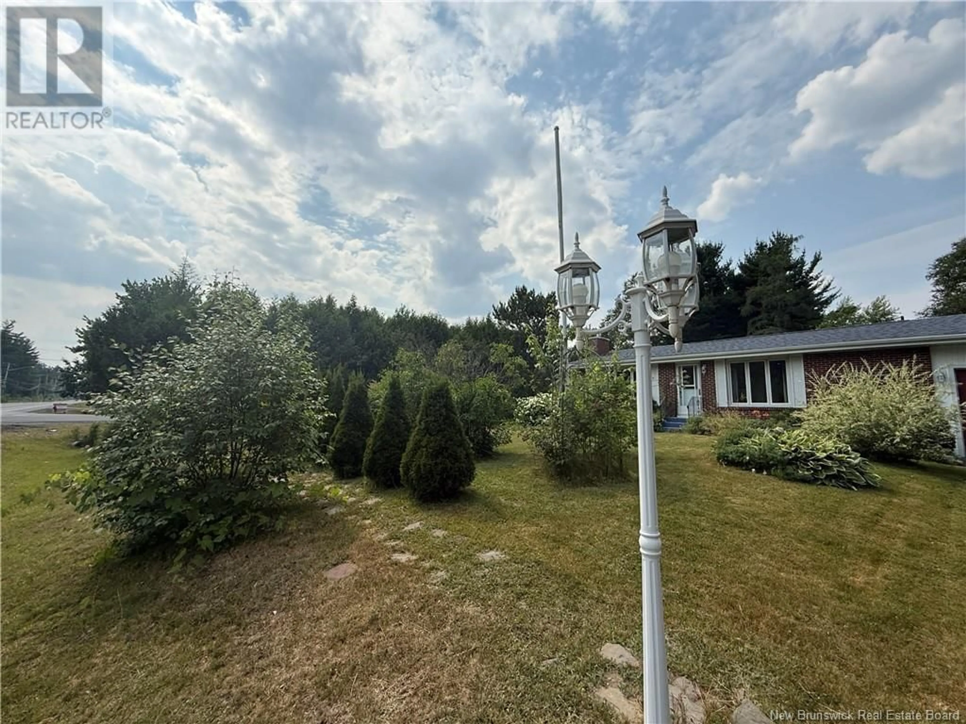 A pic from outside/outdoor area/front of a property/back of a property/a pic from drone, forest/trees view for 603 WELLINGTON, Miramichi New Brunswick E1N3M1
