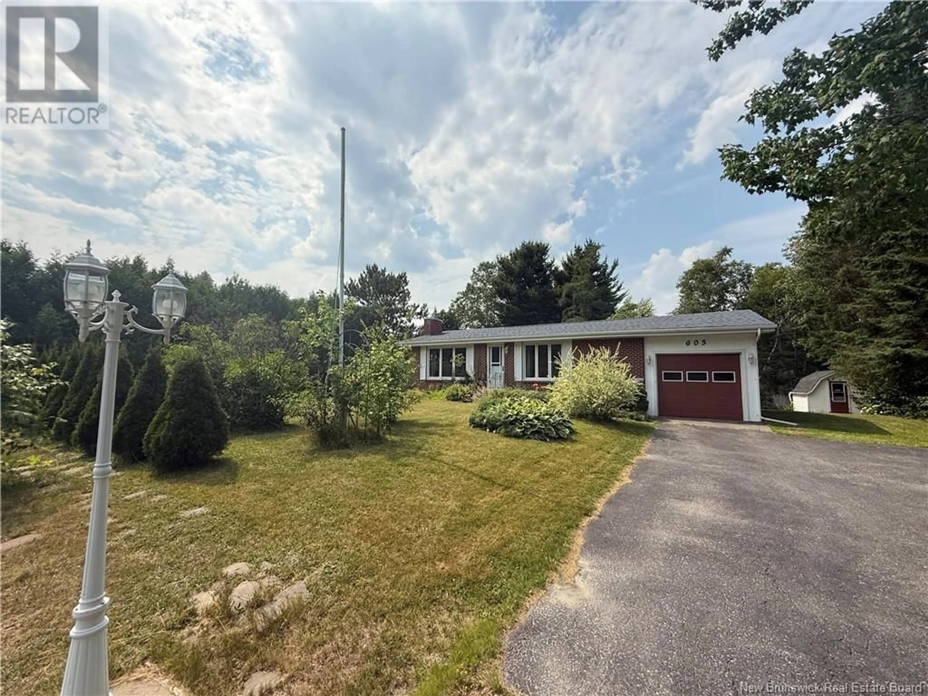 A pic from outside/outdoor area/front of a property/back of a property/a pic from drone, street for 603 WELLINGTON, Miramichi New Brunswick E1N3M1