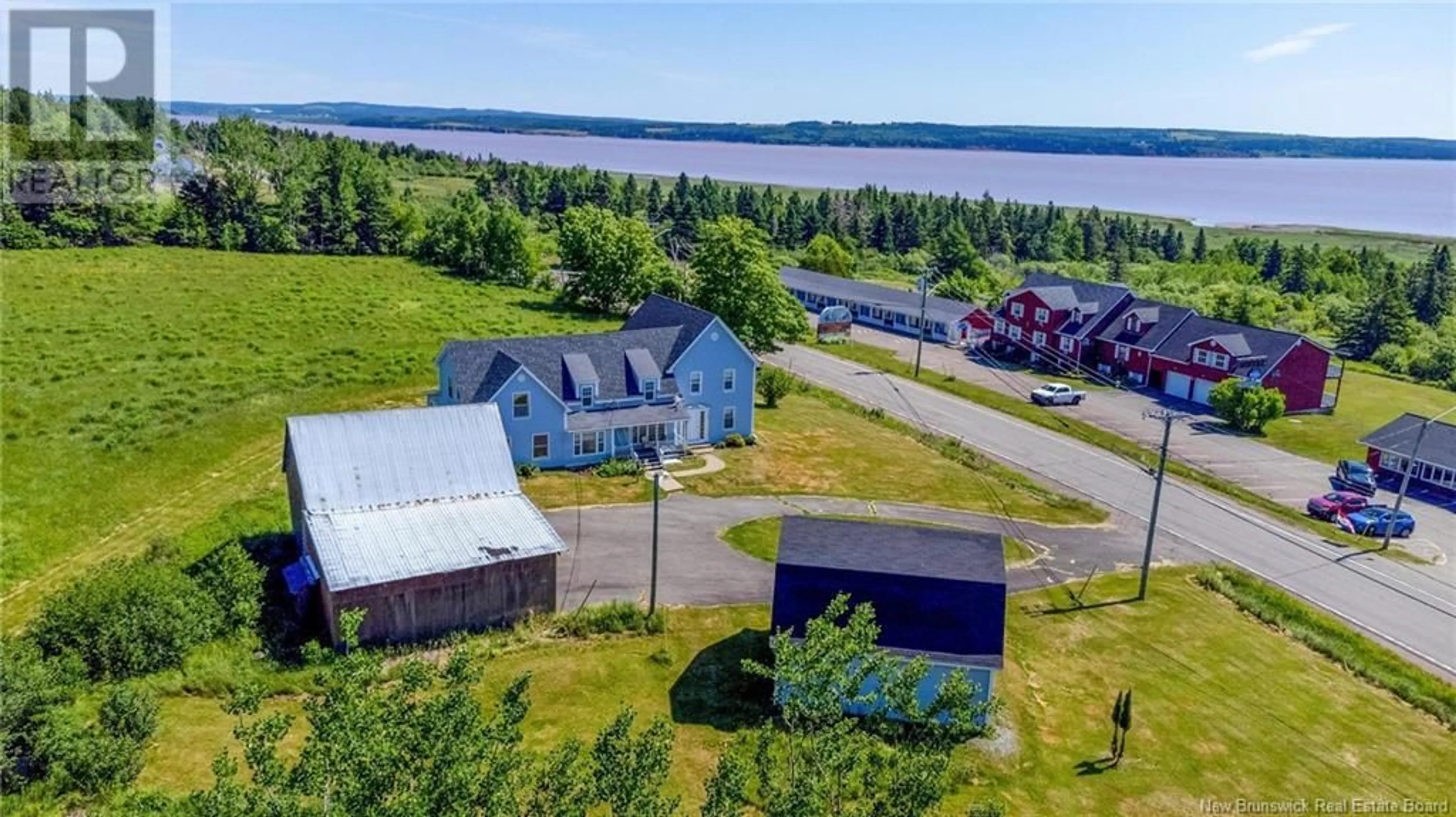 A pic from outside/outdoor area/front of a property/back of a property/a pic from drone, water/lake/river/ocean view for 4158 ROUTE 114, Hopewell Cape New Brunswick E4H3K2