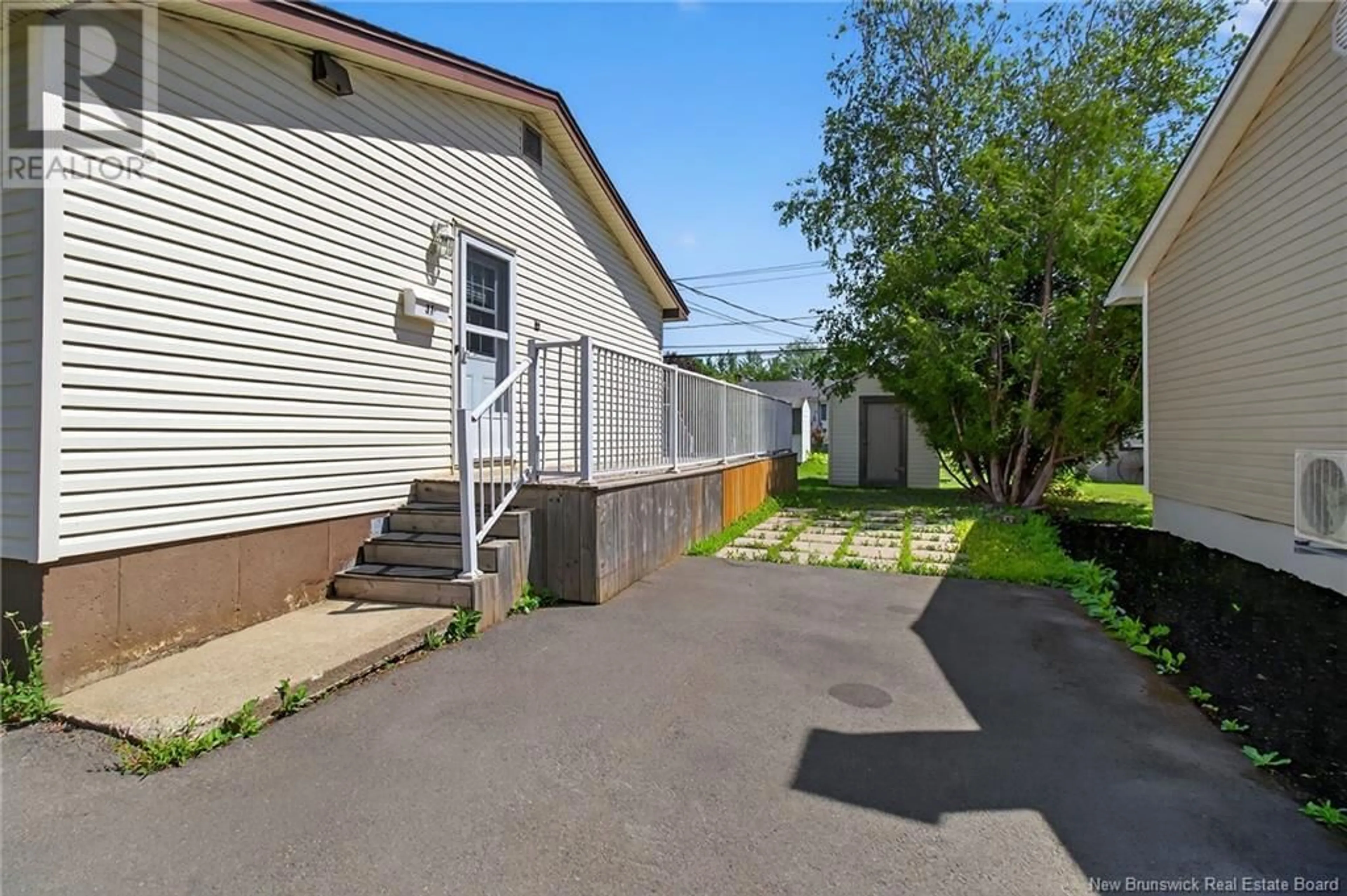 A pic from outside/outdoor area/front of a property/back of a property/a pic from drone, street for 31 MAGELLAN DRIVE, Moncton New Brunswick E1A5P3