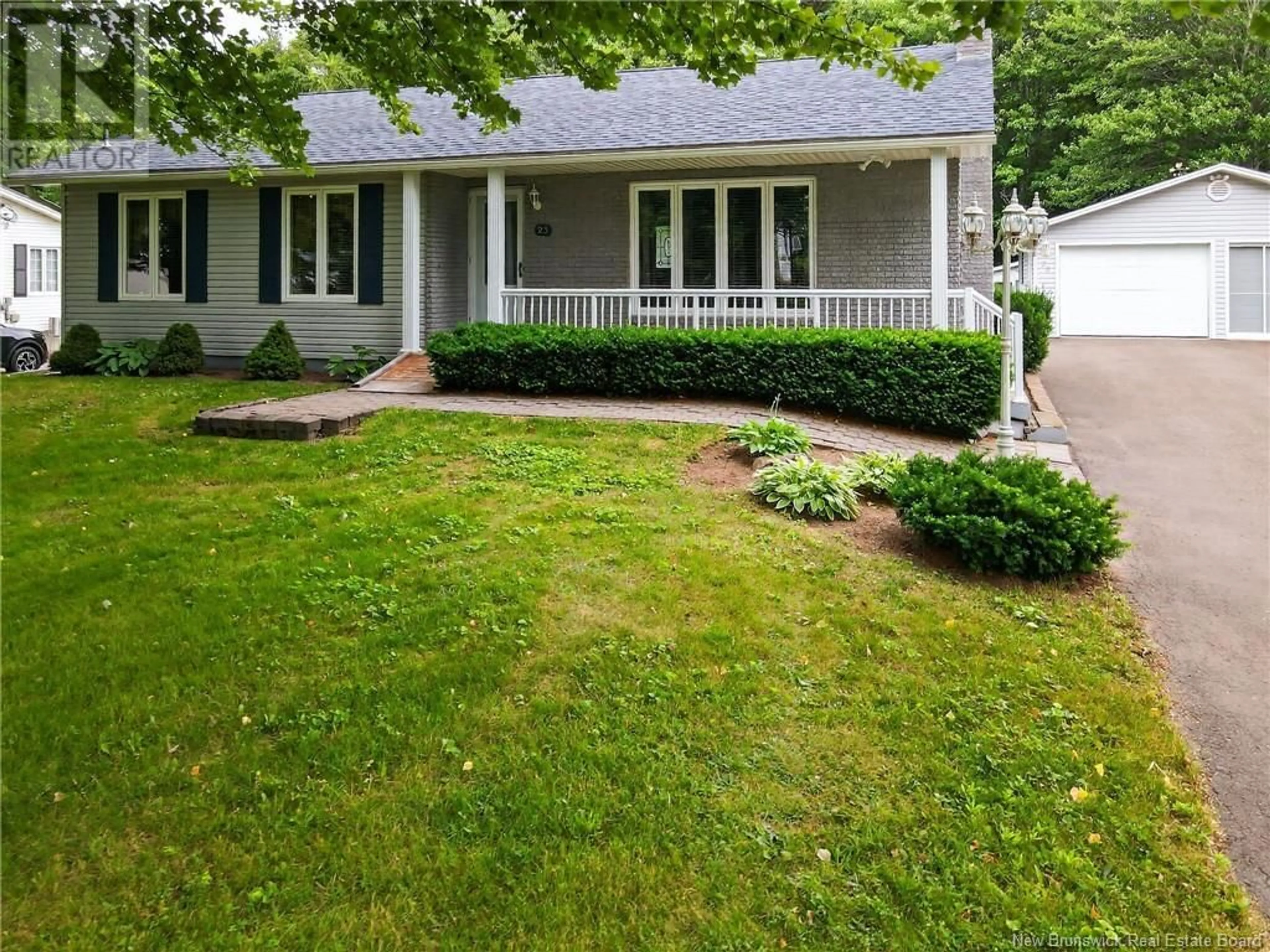 Home with vinyl exterior material, street for 23 YVON STREET, Saint-Antoine New Brunswick E4V1K3
