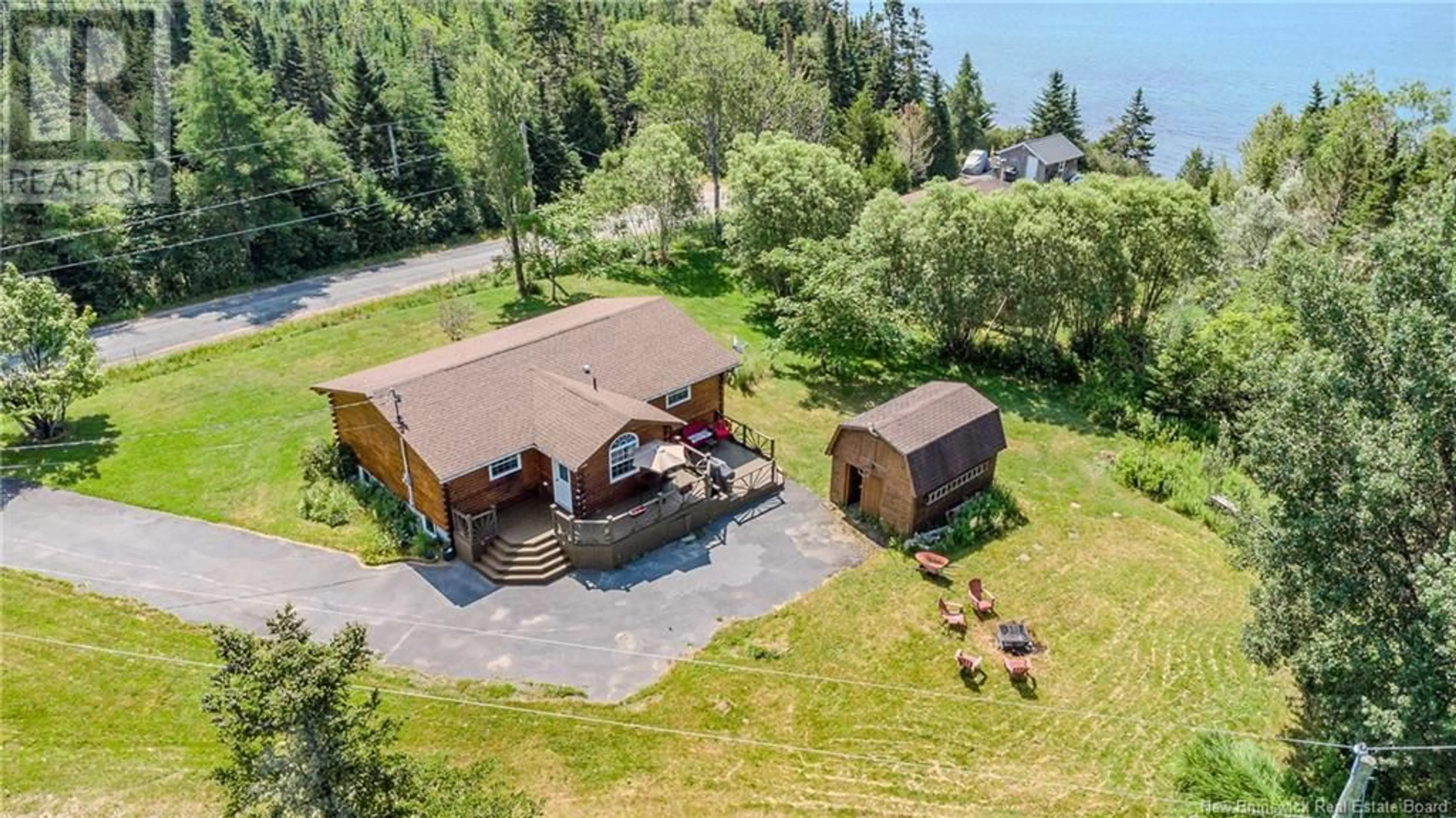A pic from outside/outdoor area/front of a property/back of a property/a pic from drone, unknown for 24 HAYLANDER ROAD, Little Lepreau New Brunswick E5J1R7