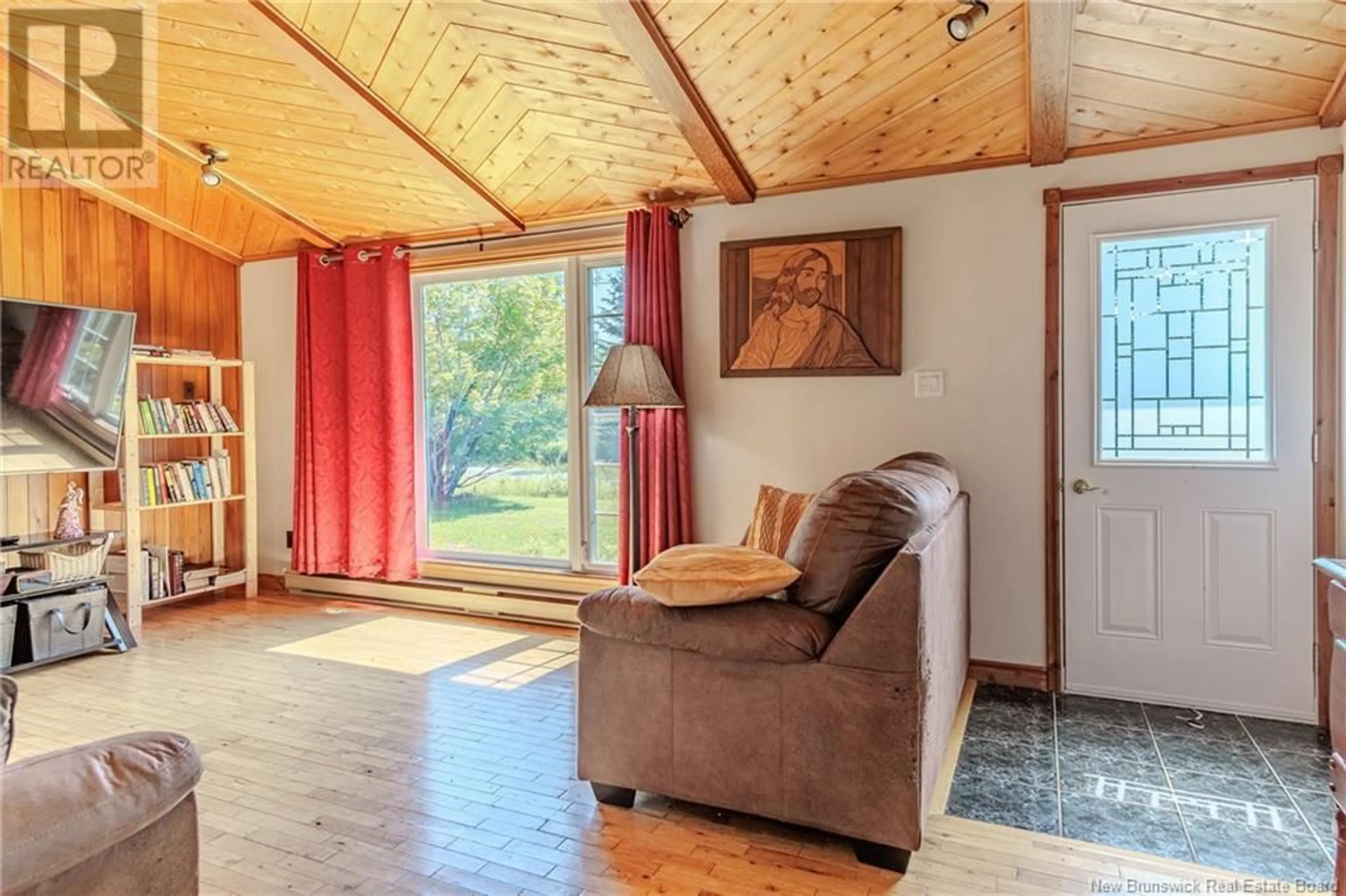 Living room with furniture, wood/laminate floor for 24 HAYLANDER ROAD, Little Lepreau New Brunswick E5J1R7