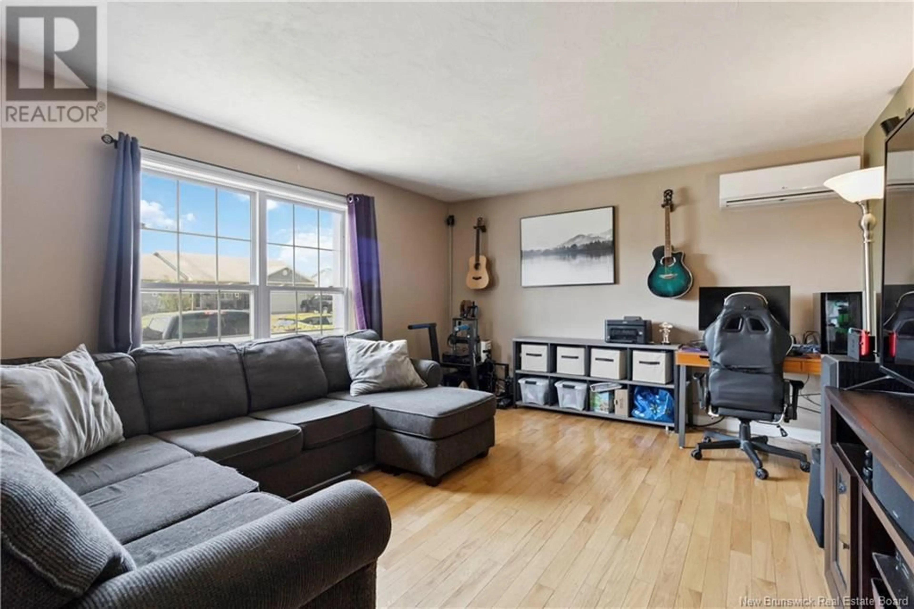 Living room with furniture, wood/laminate floor for 12 HOLLY ROAD, Riverview New Brunswick E1B0E7
