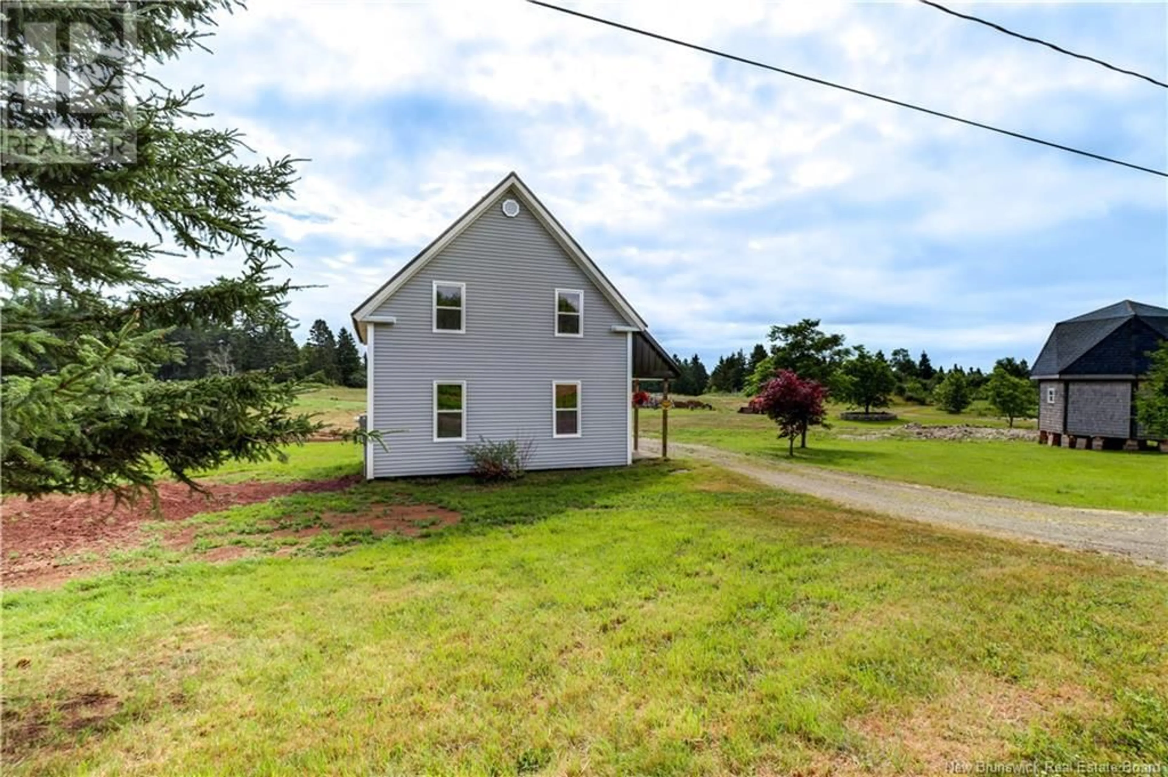 A pic from outside/outdoor area/front of a property/back of a property/a pic from drone, water/lake/river/ocean view for 1195 RTE 915, New Horton New Brunswick E4H1W4