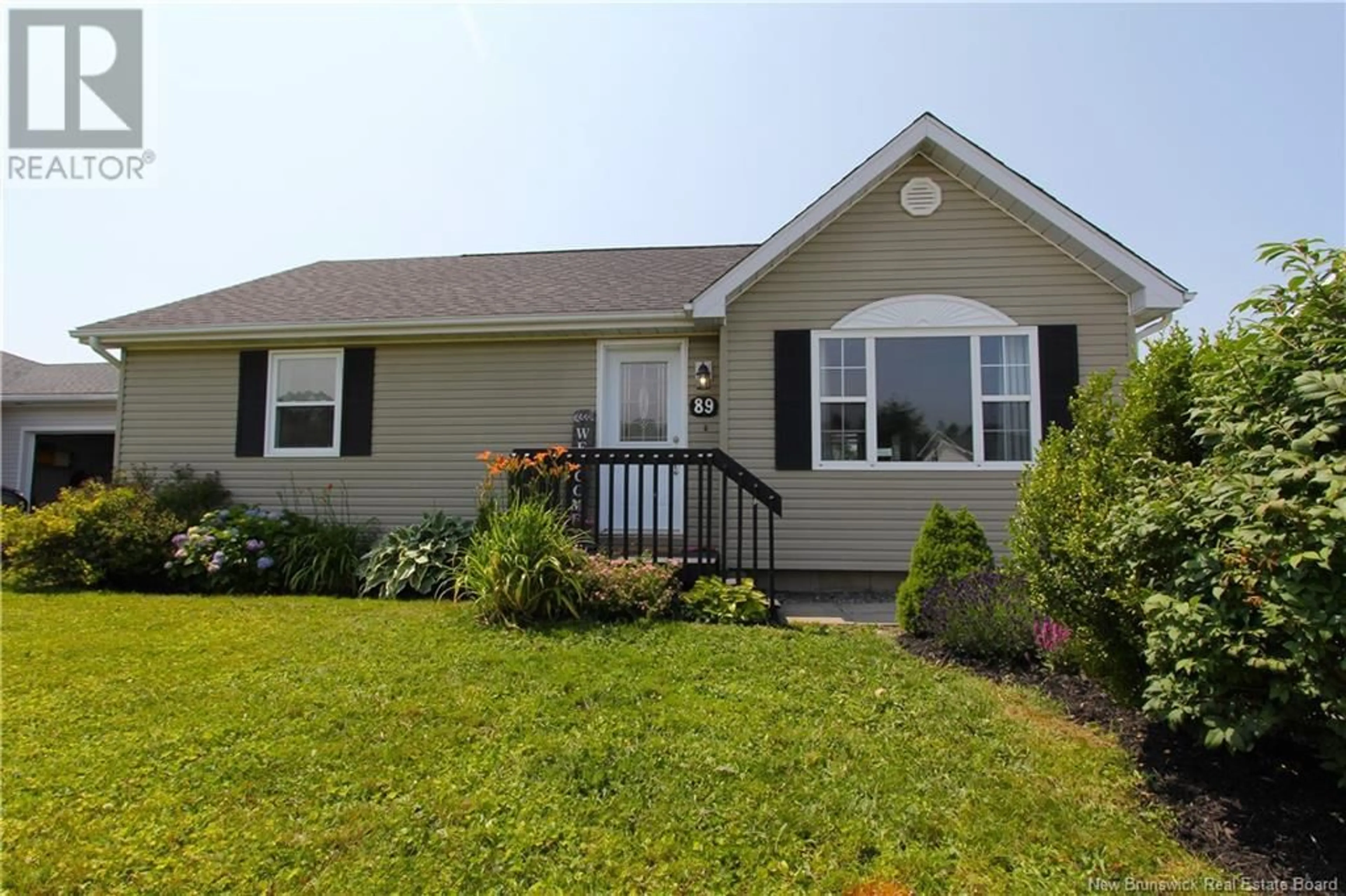 Home with vinyl exterior material, street for 89 HONEYSUCKLE DRIVE, Saint John New Brunswick E2M5T1