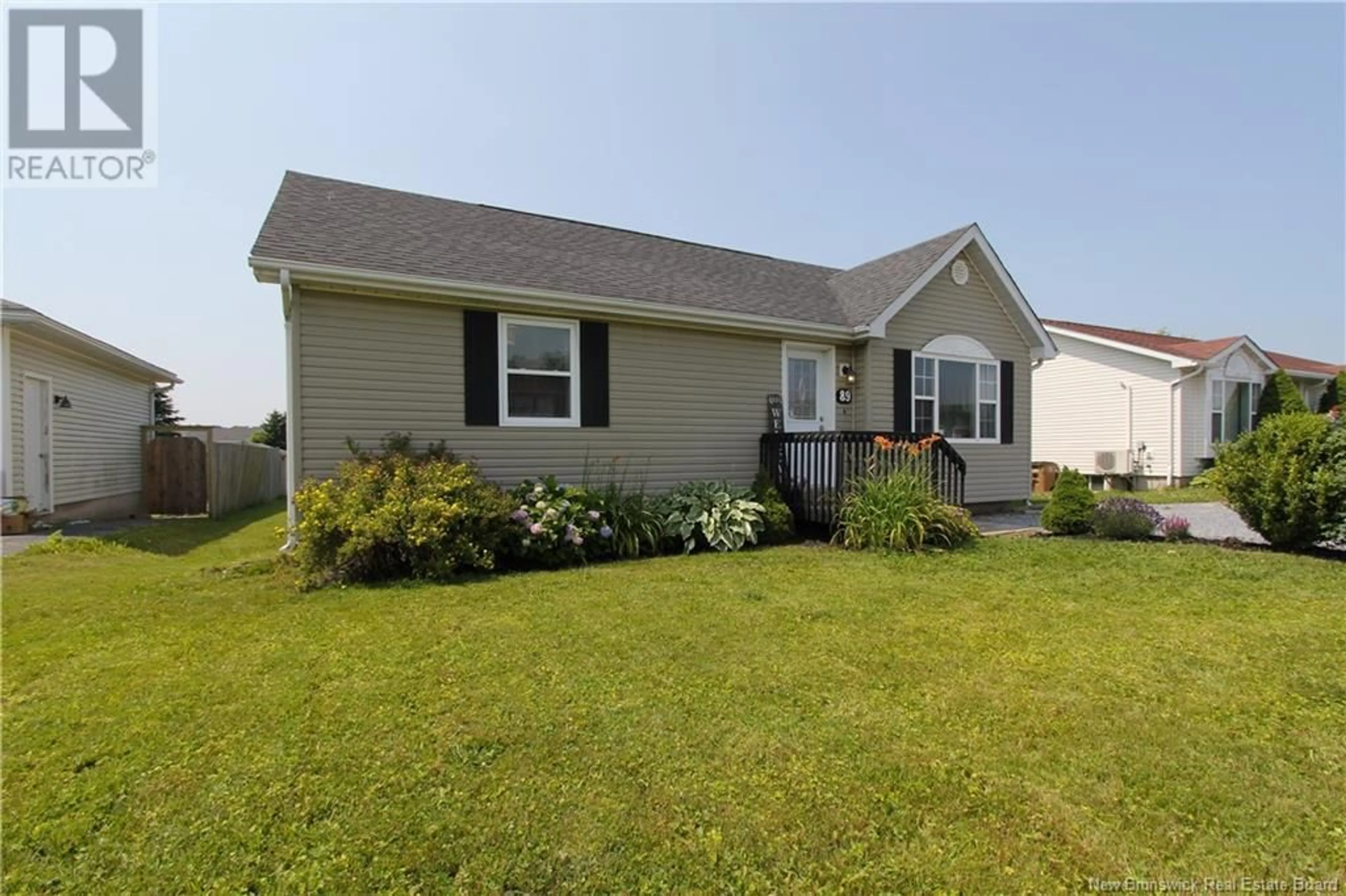 Home with vinyl exterior material, street for 89 HONEYSUCKLE DRIVE, Saint John New Brunswick E2M5T1