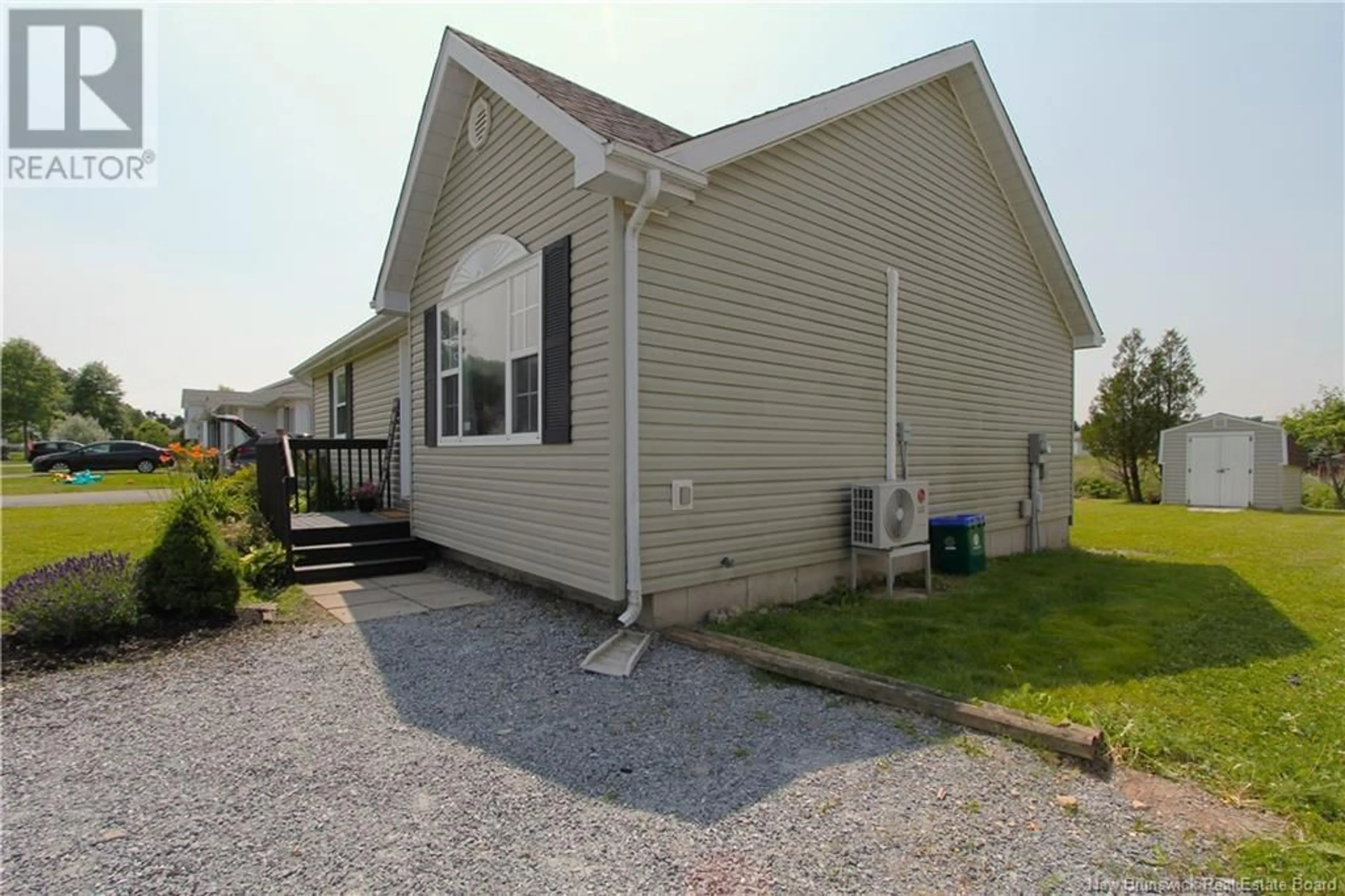 Home with vinyl exterior material, street for 89 HONEYSUCKLE DRIVE, Saint John New Brunswick E2M5T1