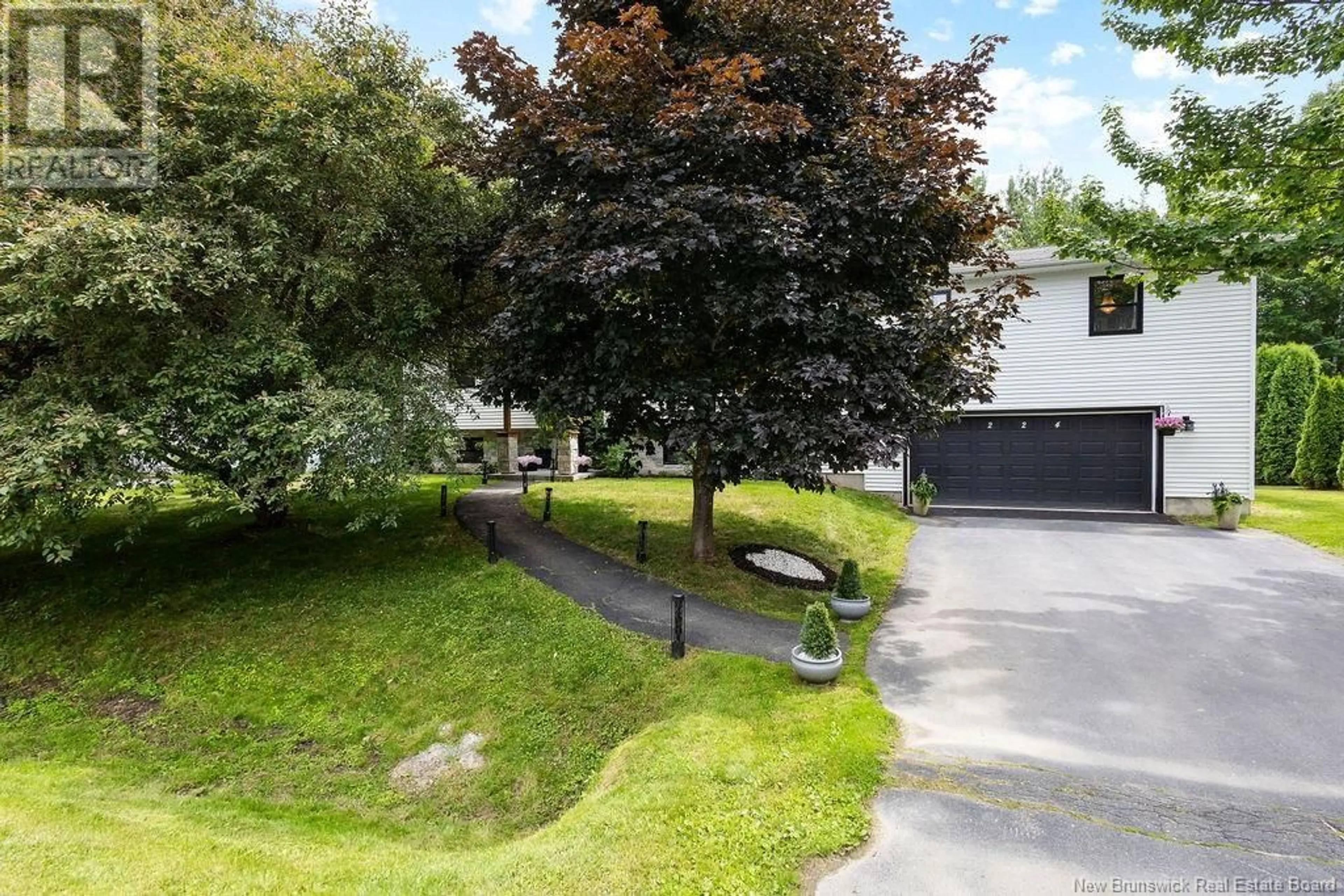A pic from outside/outdoor area/front of a property/back of a property/a pic from drone, street for 224 GERALYN DRIVE, Miramichi New Brunswick E1N3T9