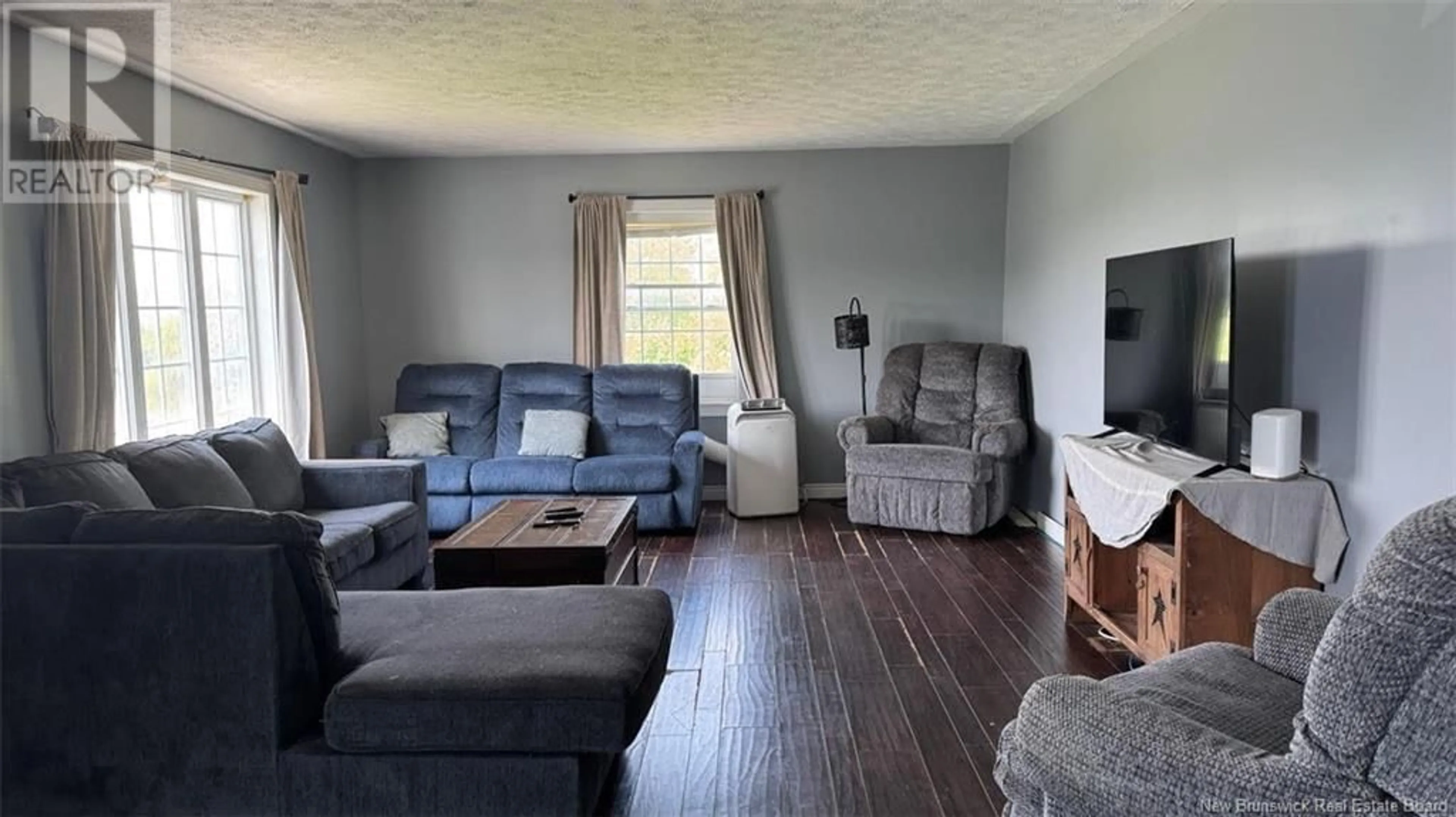 Living room with furniture, wood/laminate floor for 2886 ROUTE 108, New Denmark New Brunswick E7G2T3