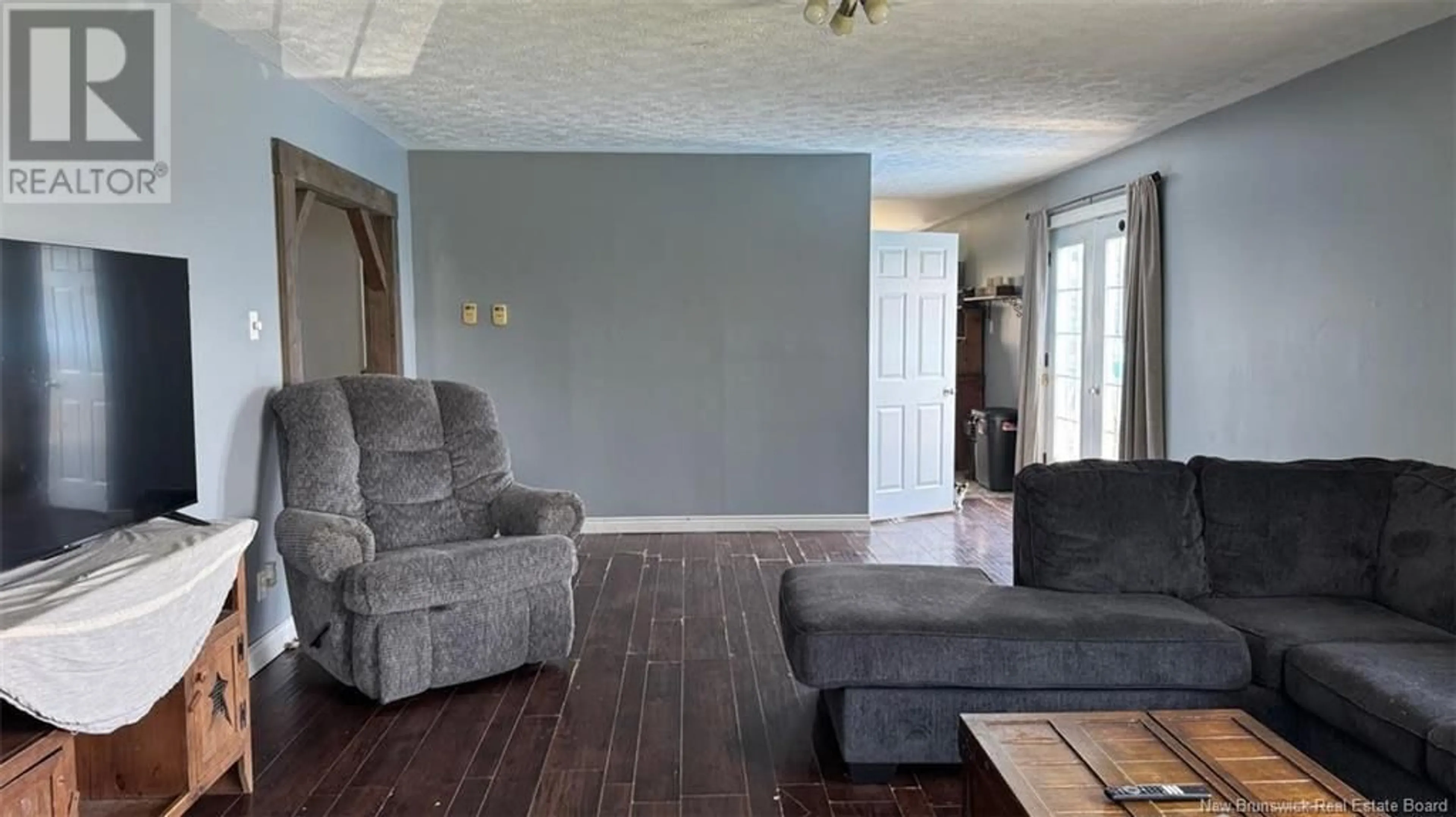 Living room with furniture, wood/laminate floor for 2886 ROUTE 108, New Denmark New Brunswick E7G2T3