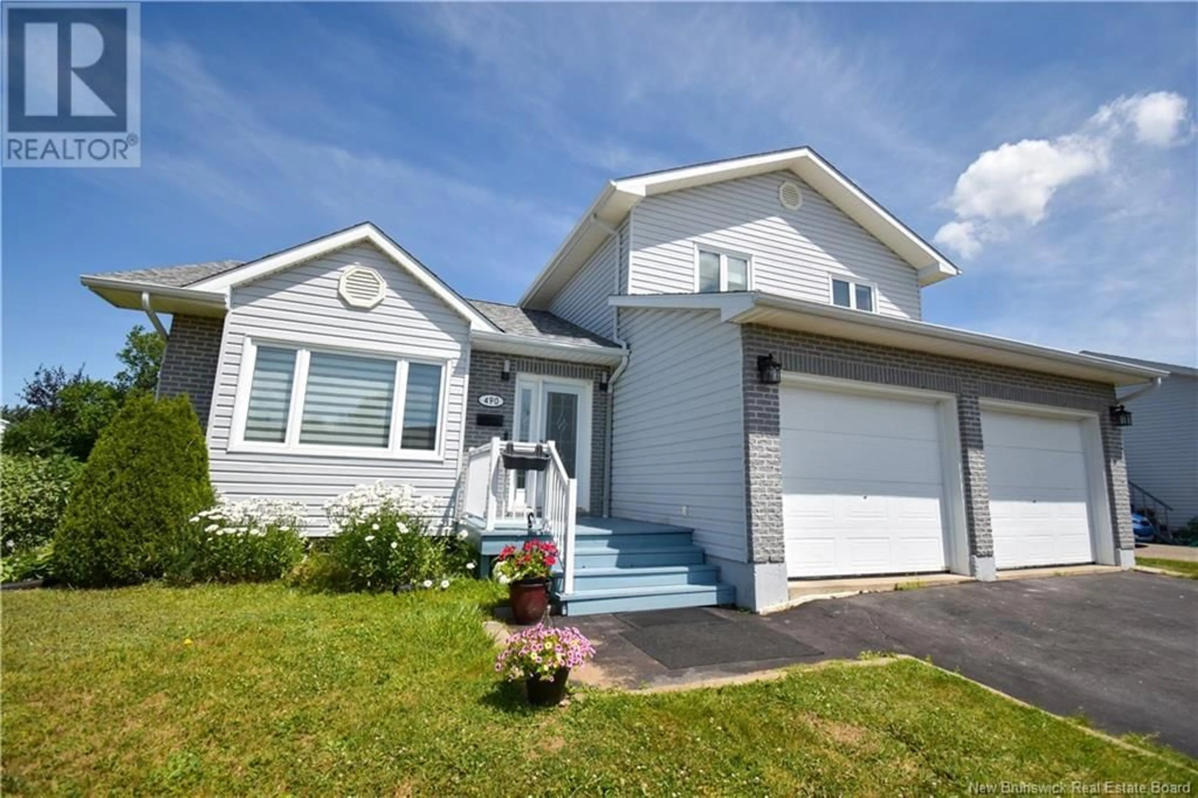 Home with vinyl exterior material, street for 490 CARTER, Bathurst New Brunswick E2A4S5