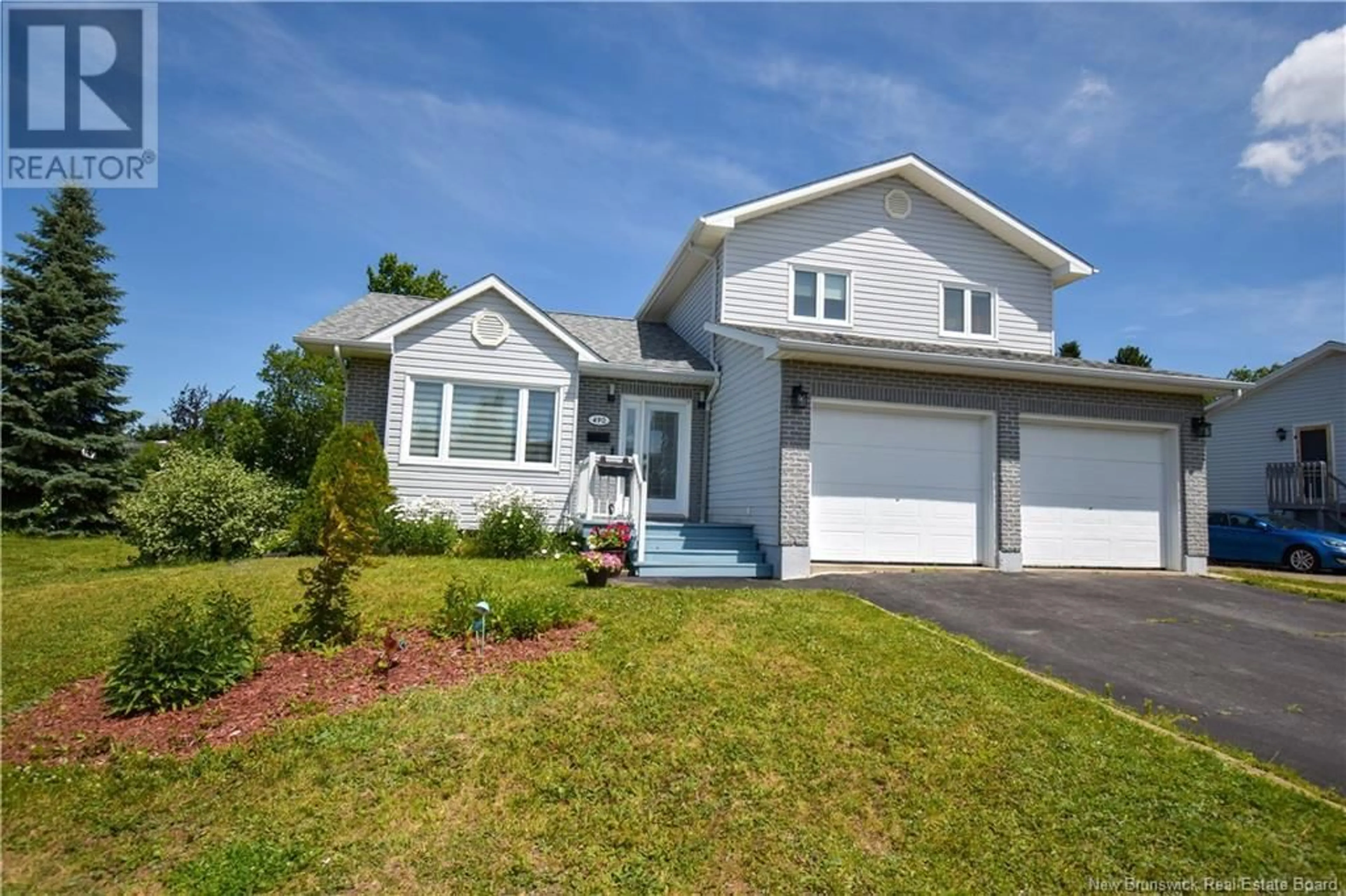 Home with vinyl exterior material, street for 490 CARTER, Bathurst New Brunswick E2A4S5