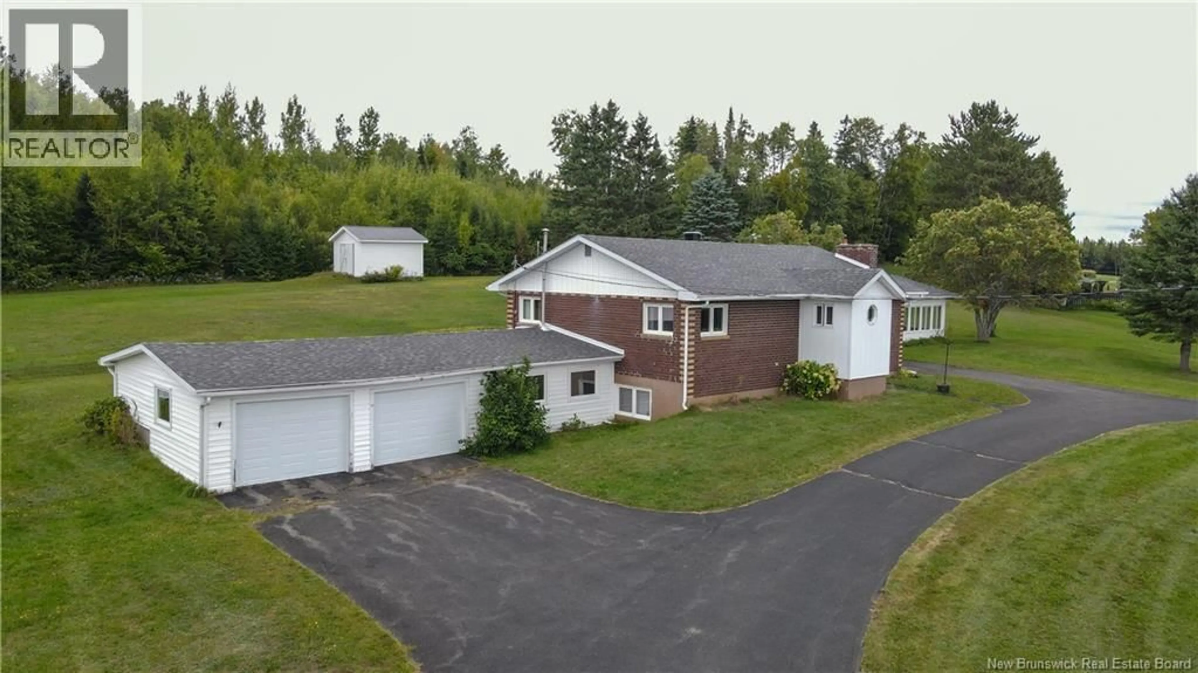 A pic from outside/outdoor area/front of a property/back of a property/a pic from drone, street for 13573 105 ROUTE, Tilley New Brunswick E7H4A1