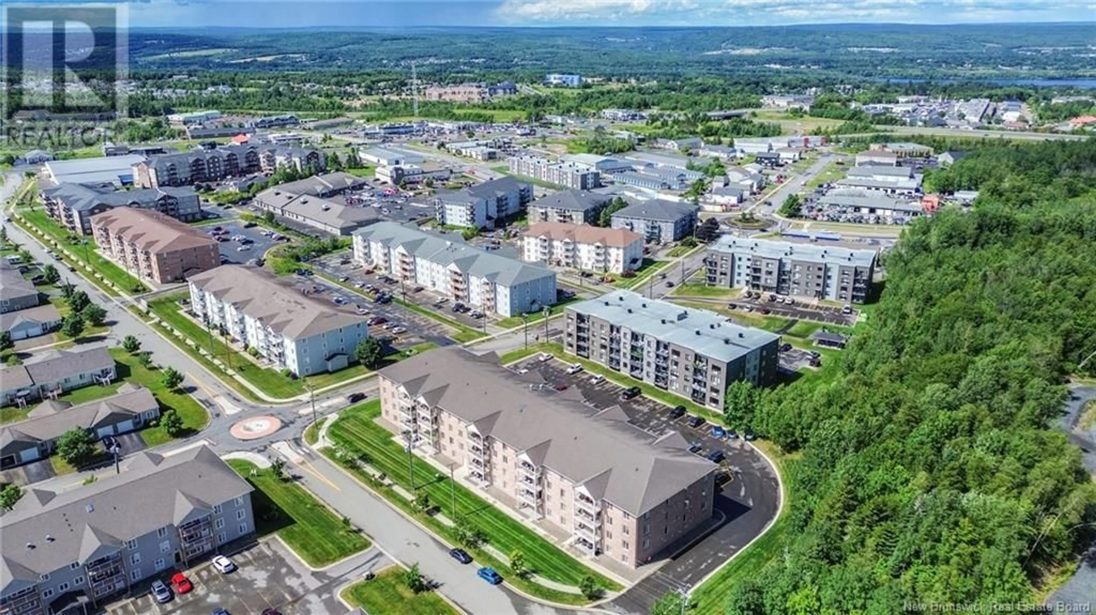 A pic from outside/outdoor area/front of a property/back of a property/a pic from drone, unknown for 107 - 165 VALCOUR, Fredericton New Brunswick E3C0H5