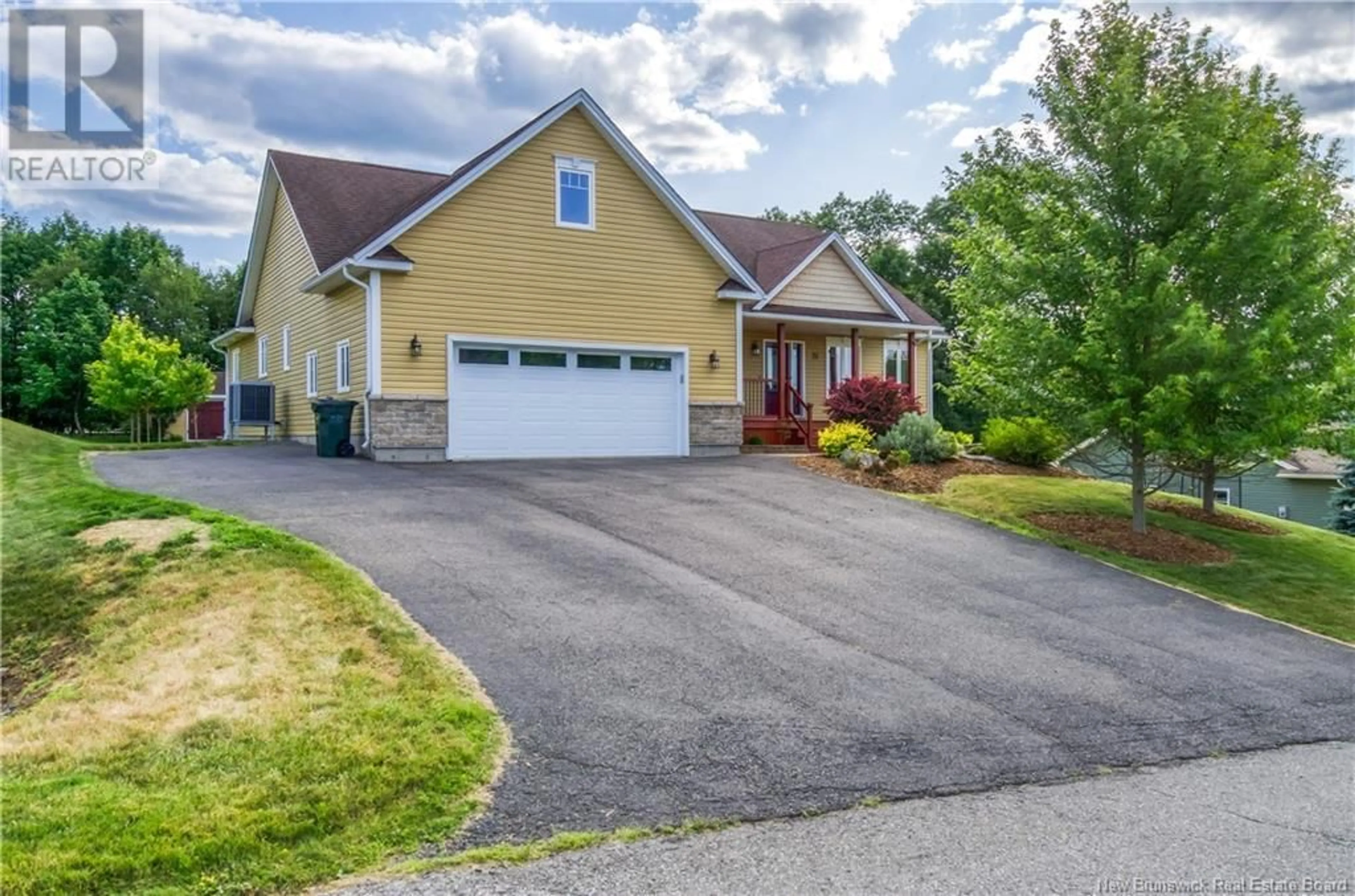 Home with vinyl exterior material, street for 79 LAURA DRIVE, Quispamsis New Brunswick E2E6B4