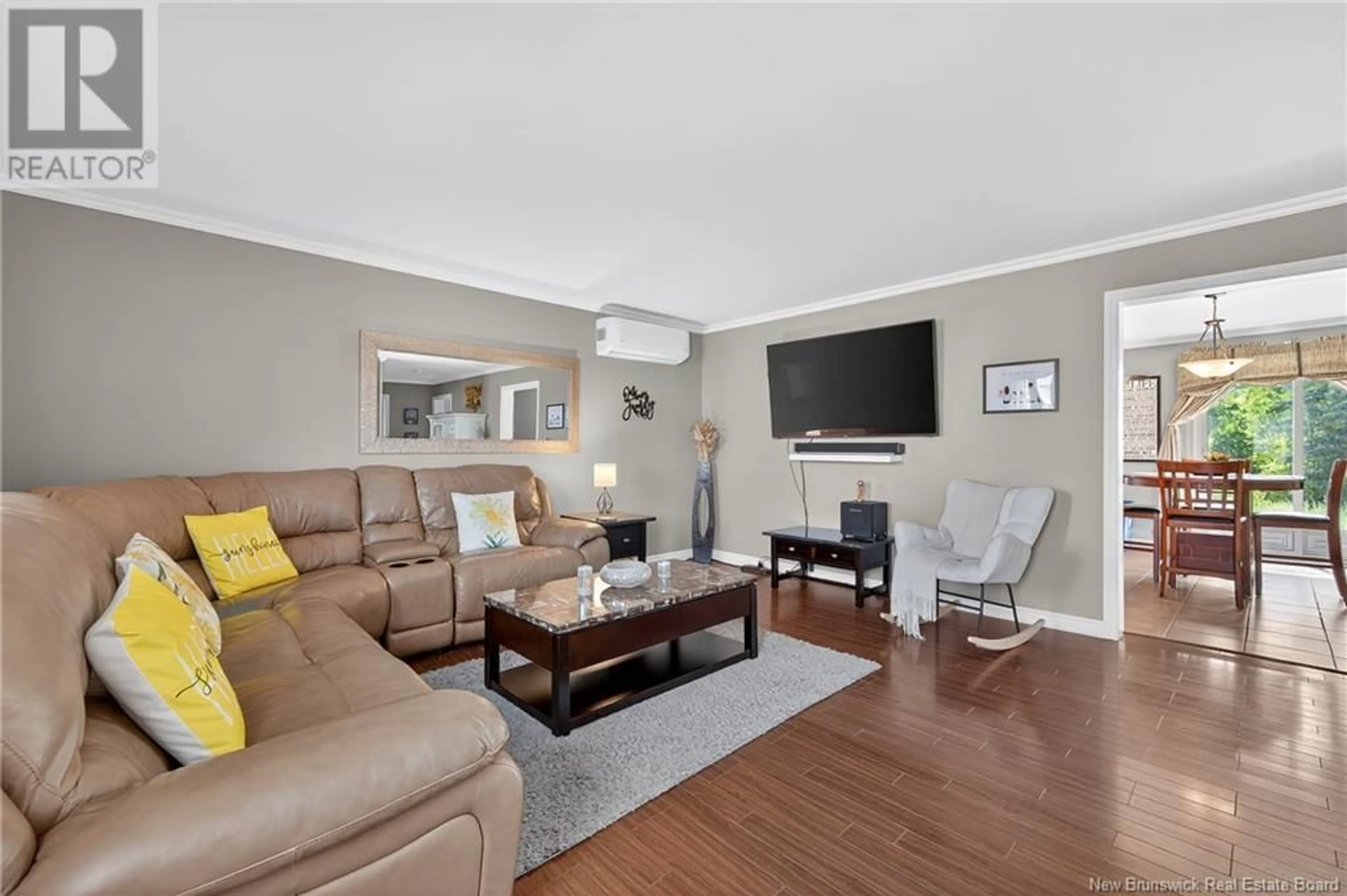 Living room with furniture, wood/laminate floor for 1226 DES PIONNIERS AVENUE, Balmoral New Brunswick E8E1E7