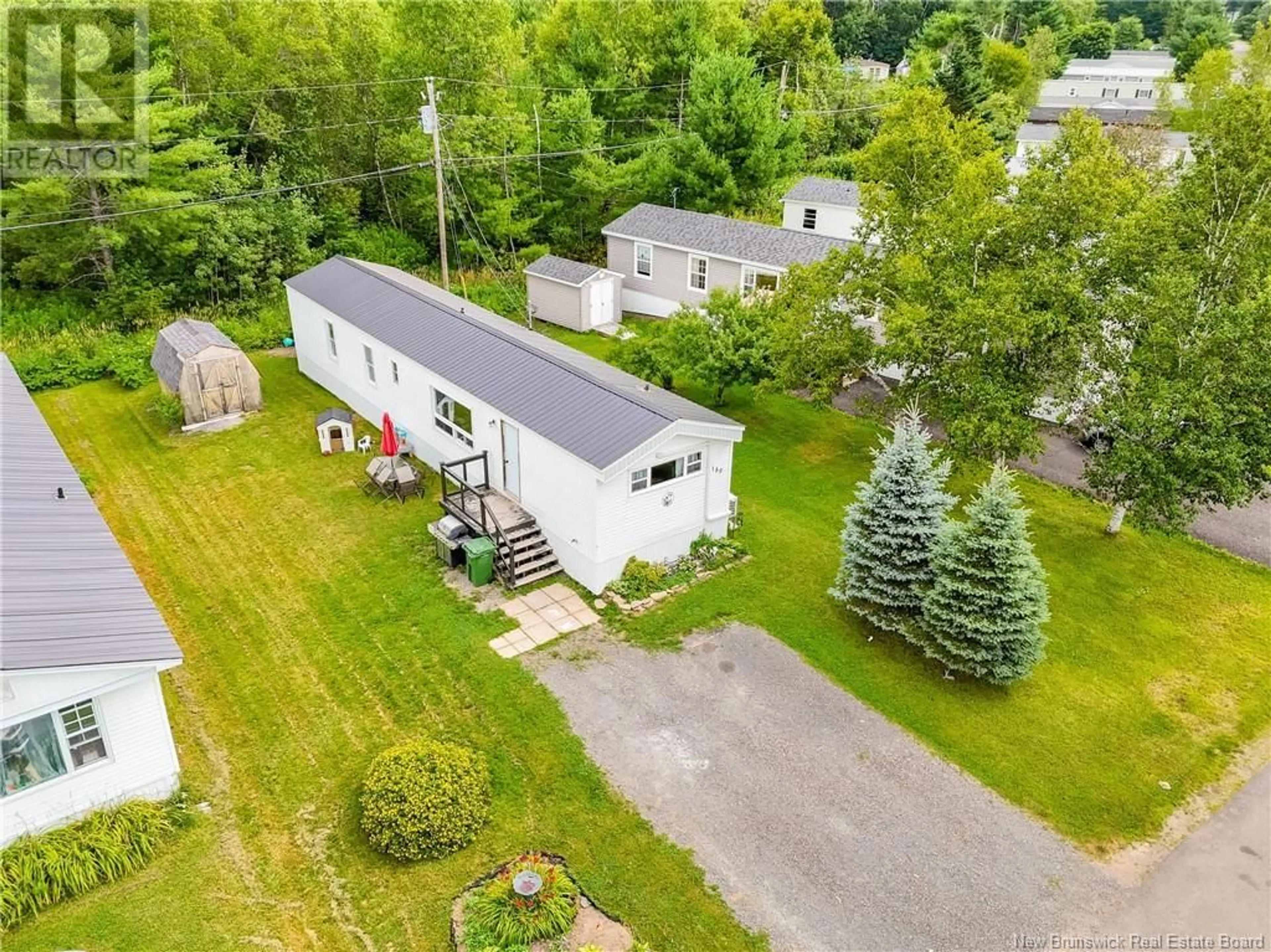 A pic from outside/outdoor area/front of a property/back of a property/a pic from drone, unknown for 180 HEDGEVIEW DRIVE, Fredericton New Brunswick E3B6S4