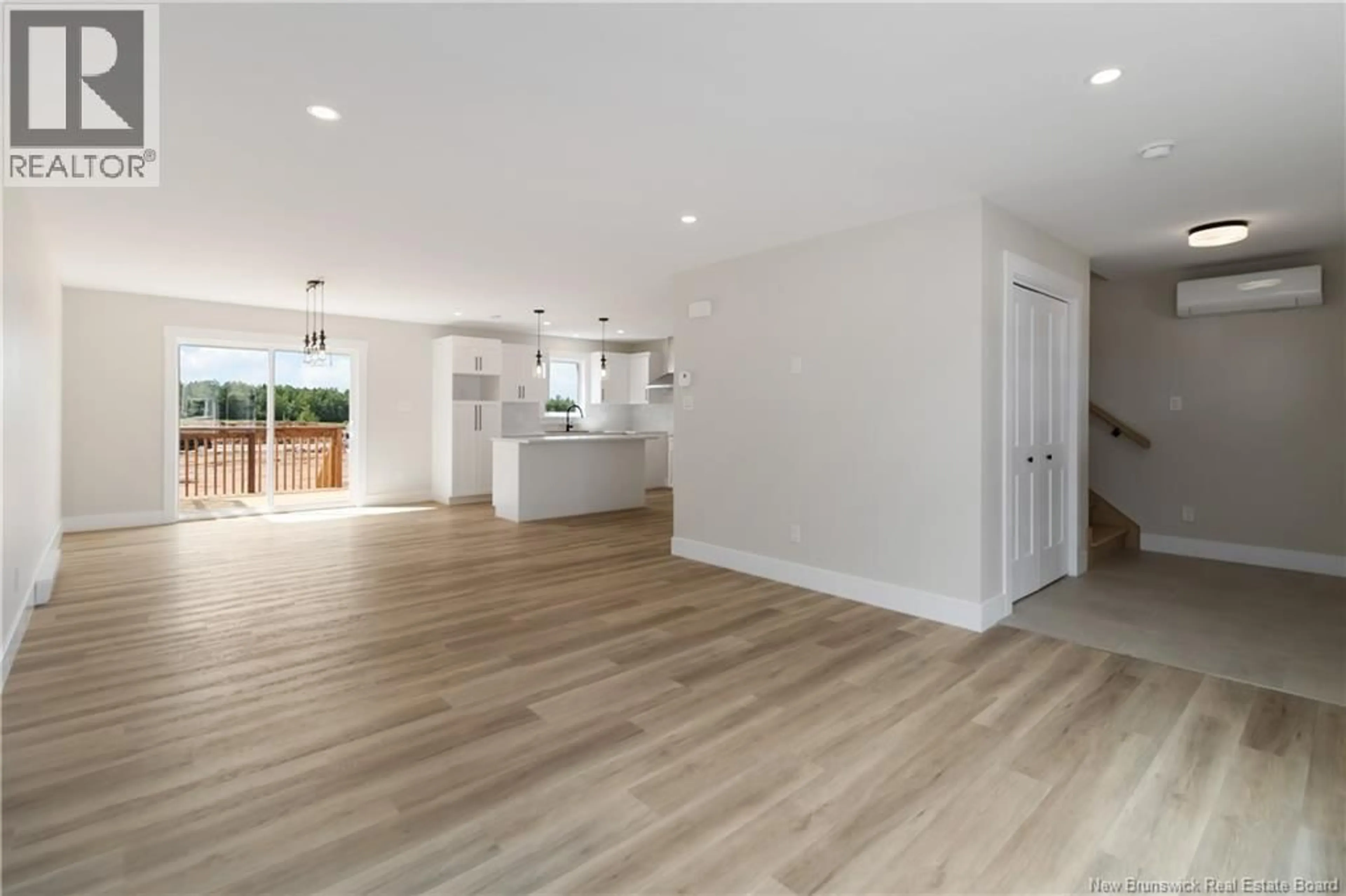 Open concept kitchen, wood/laminate floor for 74 ALOSIER CRESCENT, Moncton New Brunswick E1K0A1