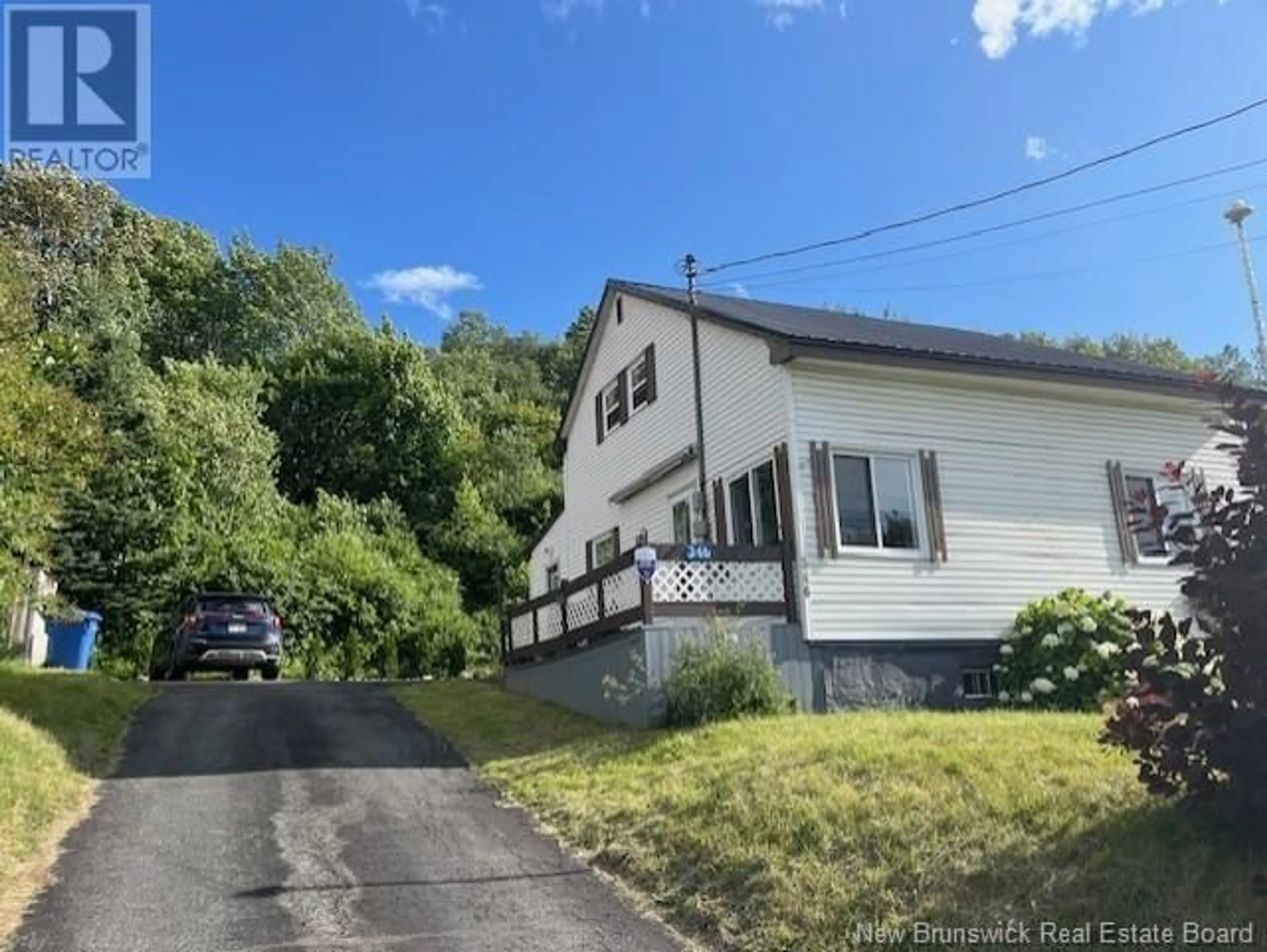 A pic from outside/outdoor area/front of a property/back of a property/a pic from drone, street for 346 NOTRE DAME STREET, Atholville New Brunswick E3N4A2