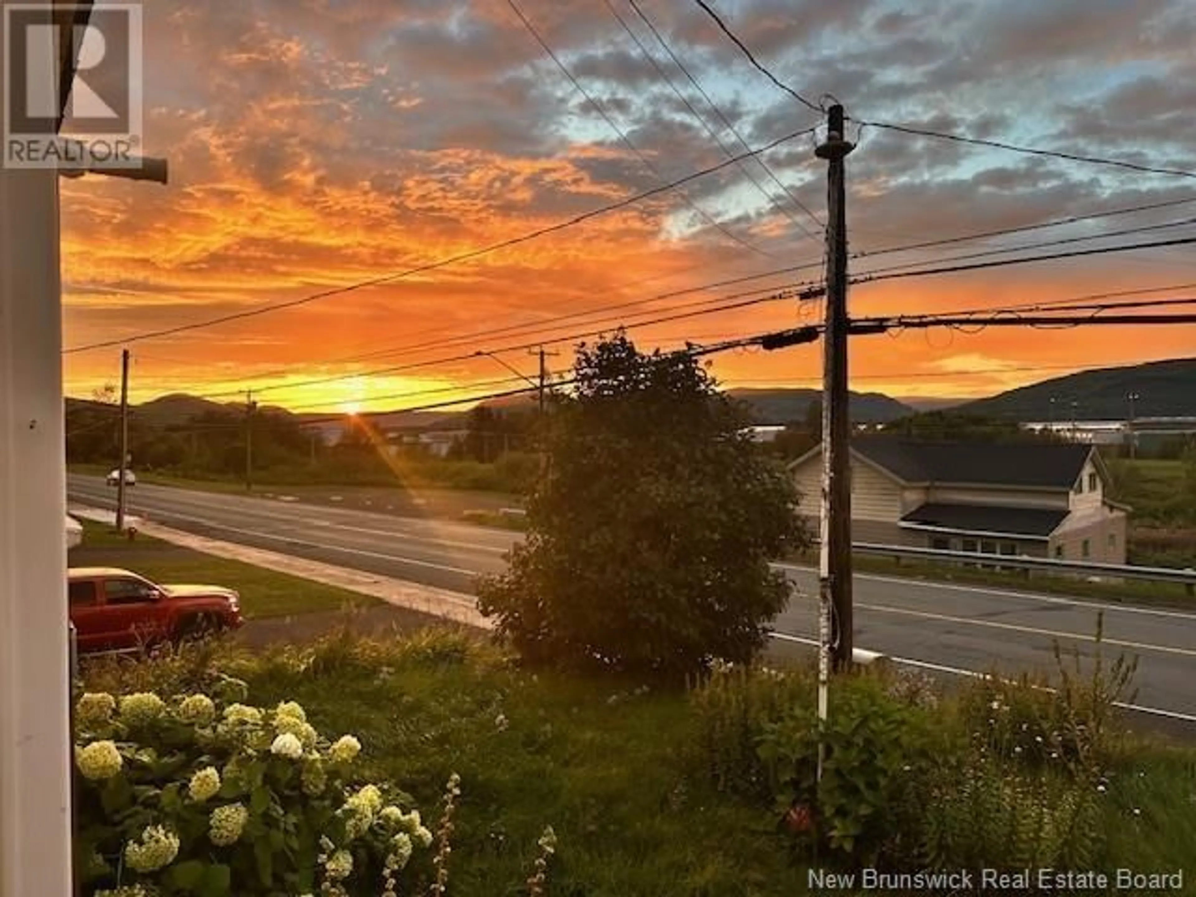 A pic from outside/outdoor area/front of a property/back of a property/a pic from drone, mountain view for 346 NOTRE DAME STREET, Atholville New Brunswick E3N4A2