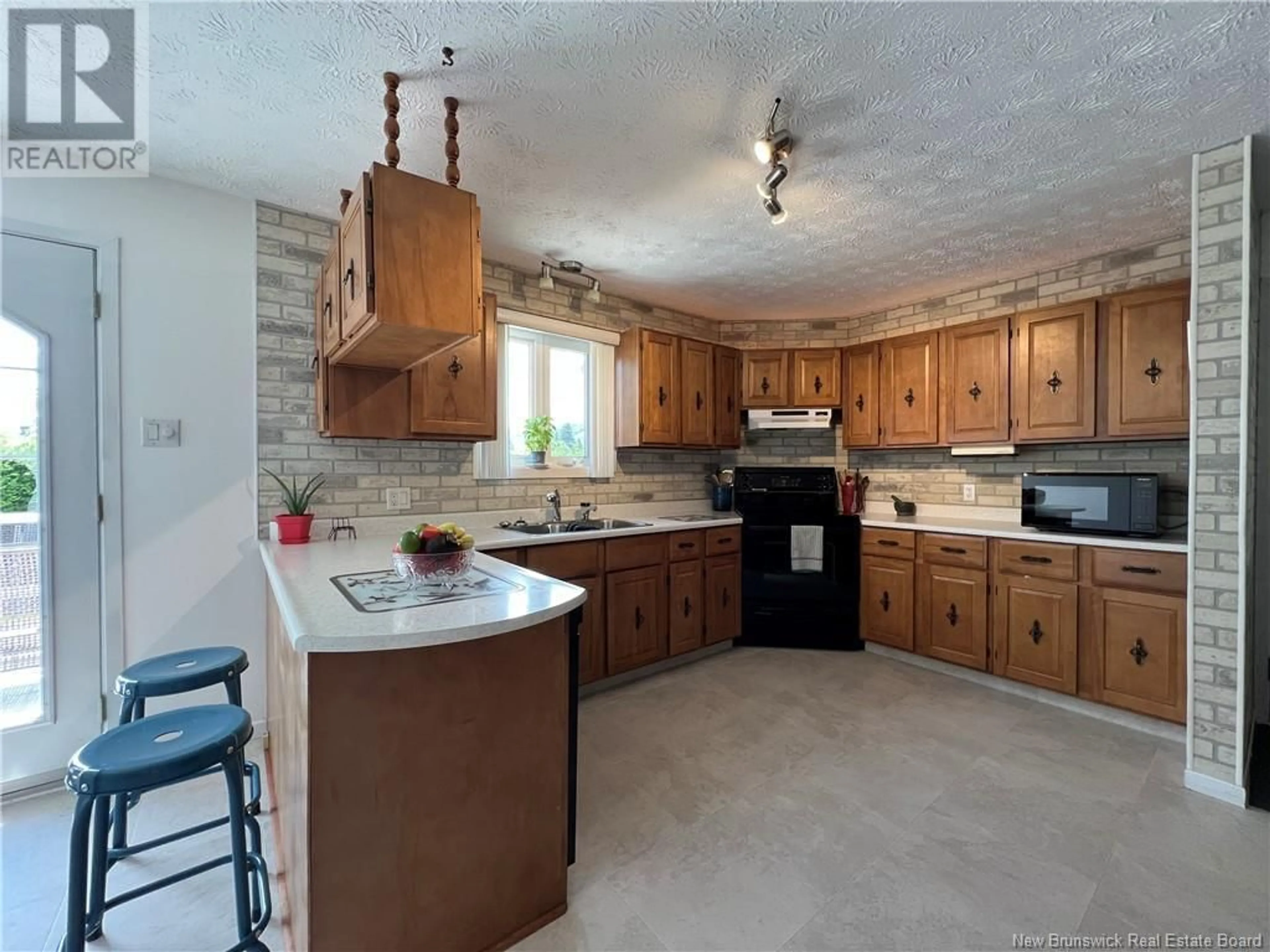 Standard kitchen, ceramic/tile floor for 43 OUELLETTE STREET, Saint-Jacques New Brunswick E7B1N1