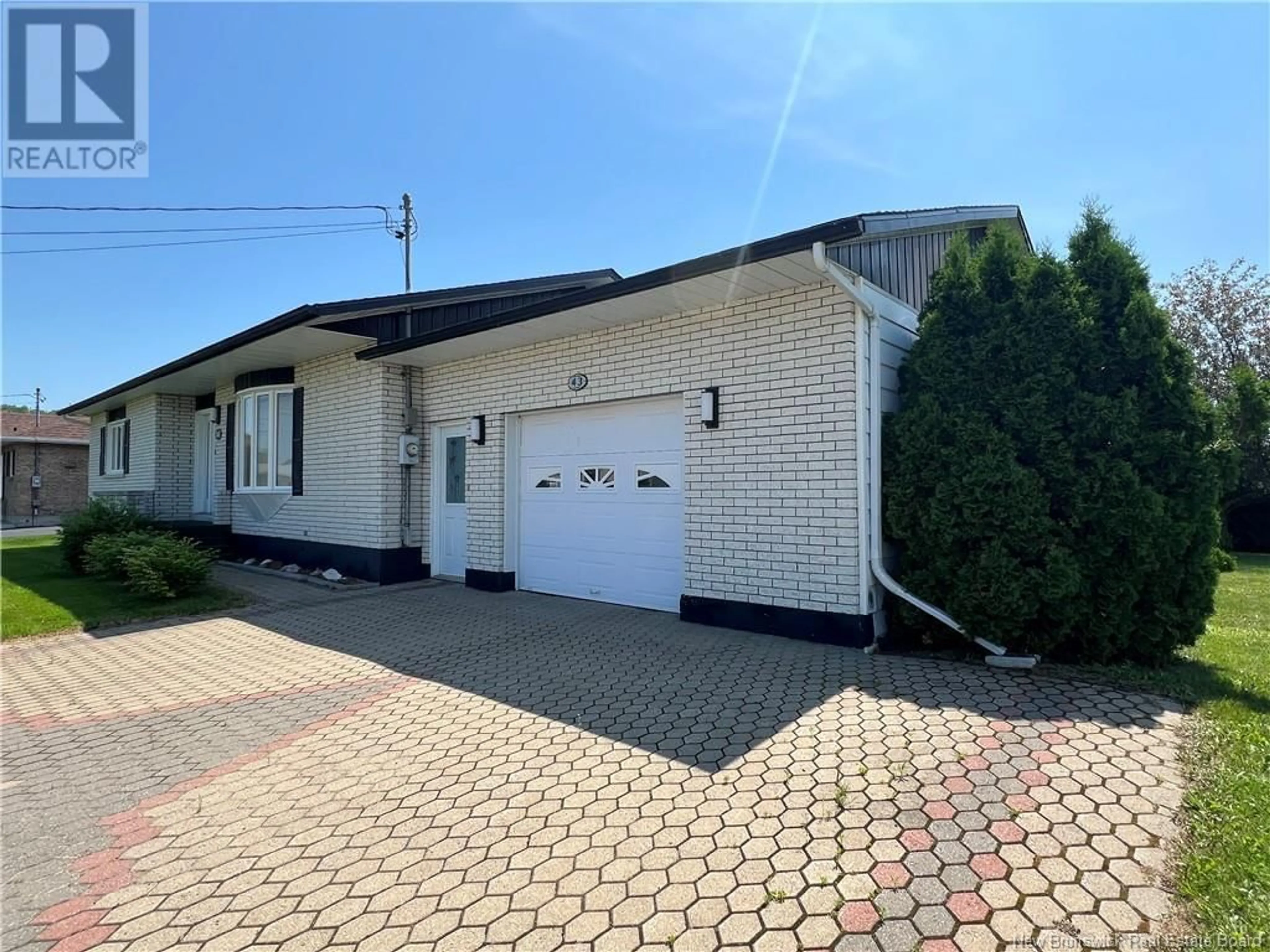 Home with brick exterior material, street for 43 OUELLETTE STREET, Saint-Jacques New Brunswick E7B1N1