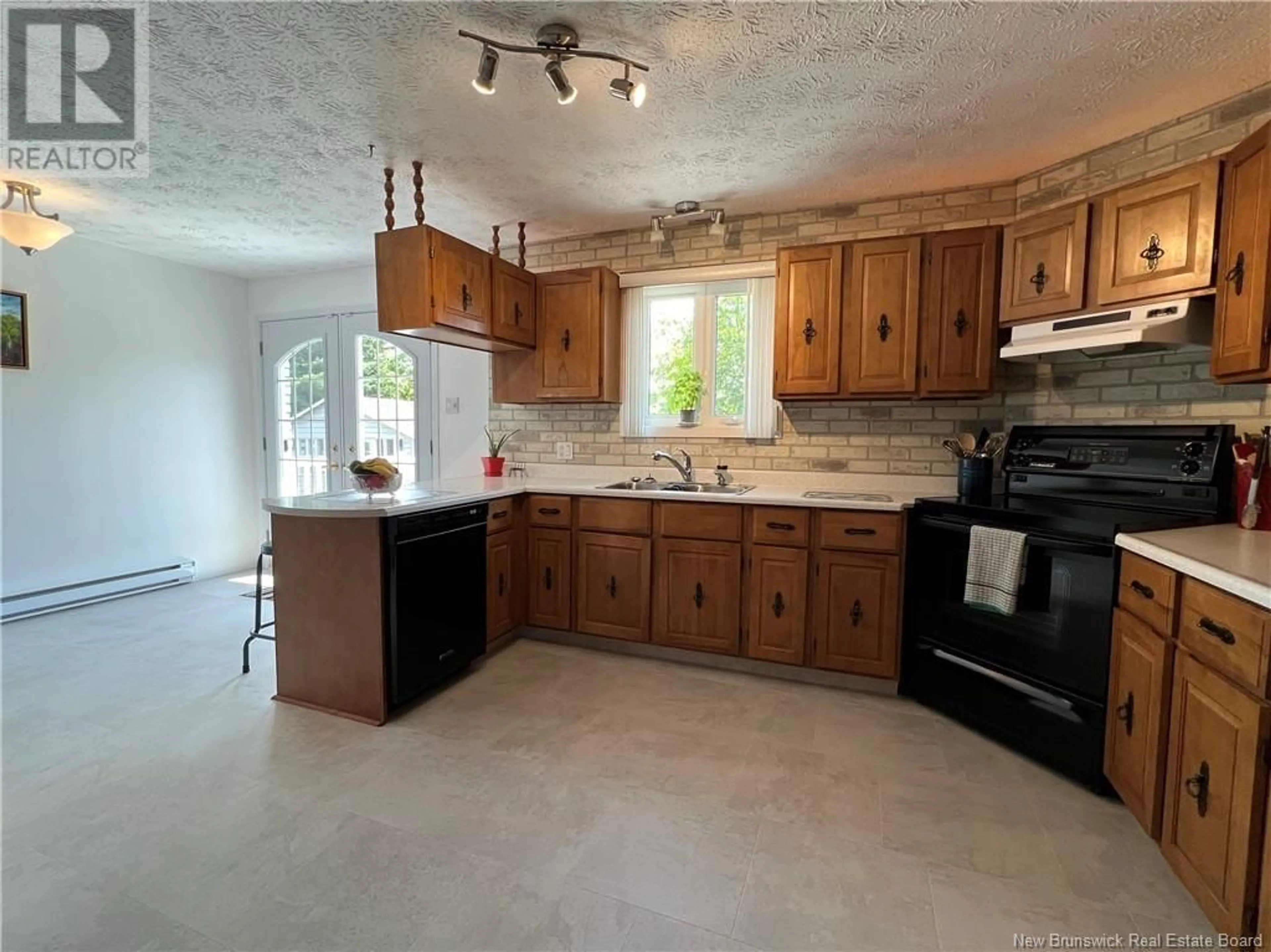 Standard kitchen, ceramic/tile floor for 43 OUELLETTE STREET, Saint-Jacques New Brunswick E7B1N1