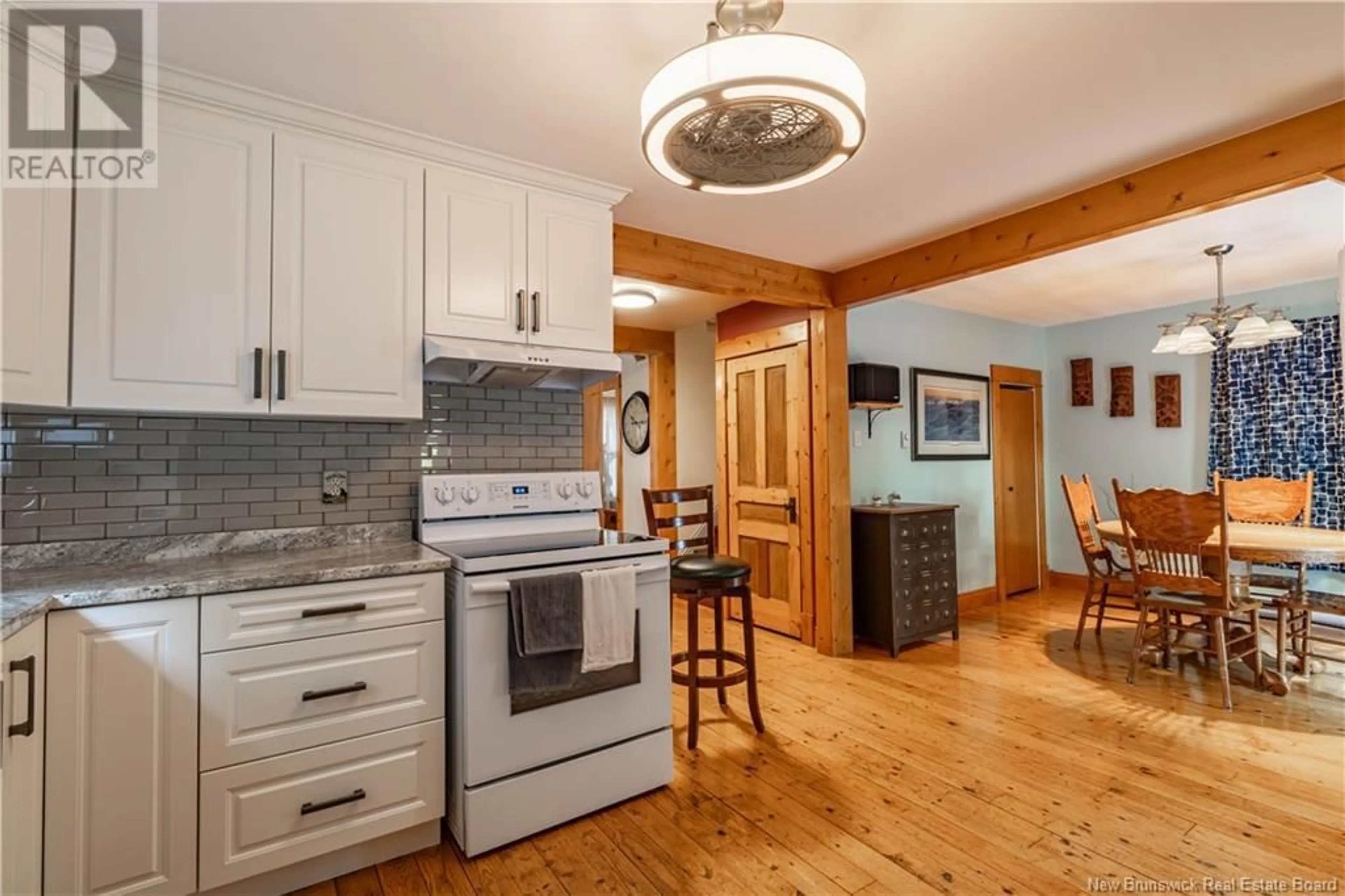 Open concept kitchen, wood/laminate floor for 50 PETER STREET, Sussex New Brunswick E4E2J6