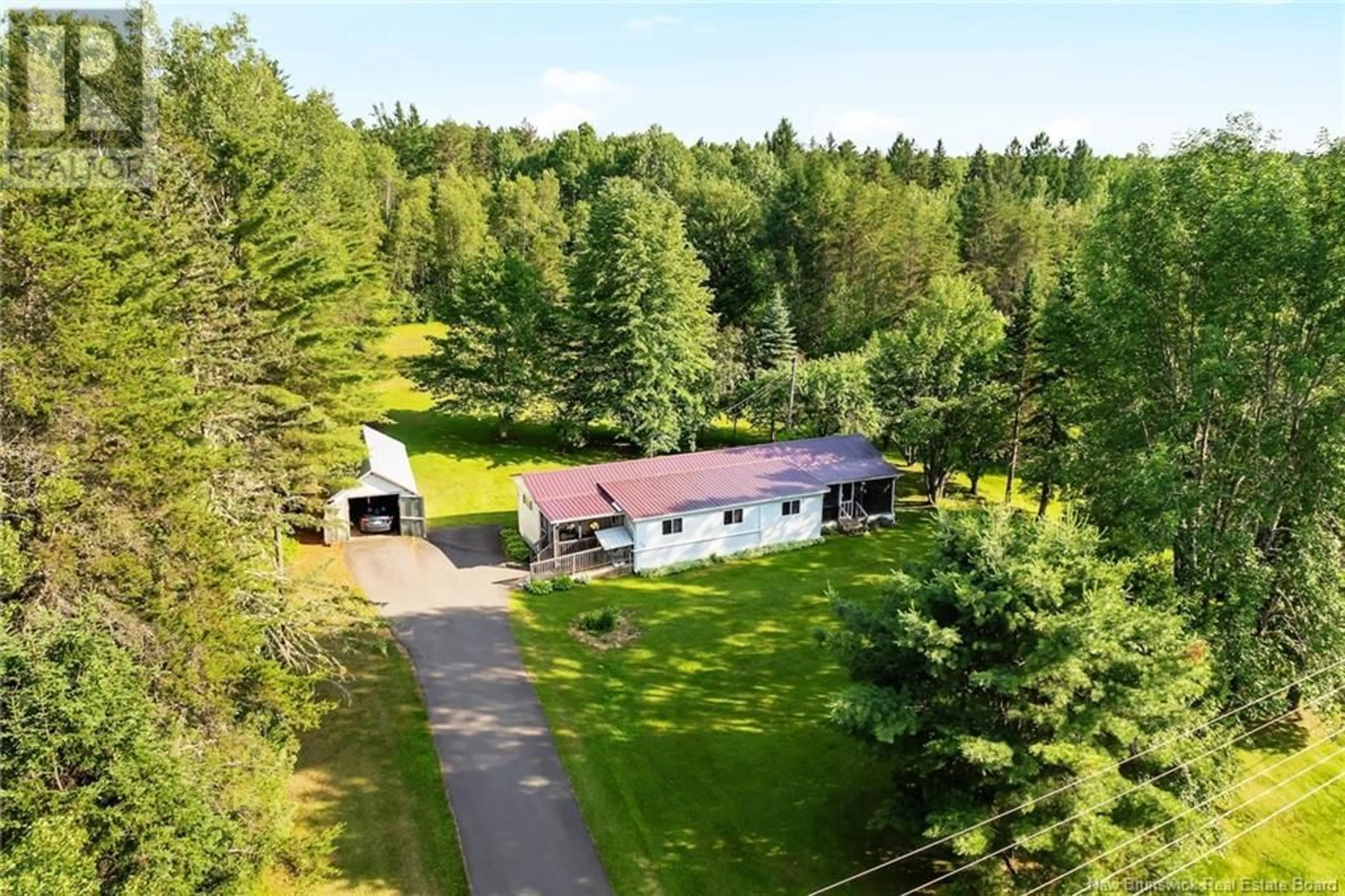 A pic from outside/outdoor area/front of a property/back of a property/a pic from drone, forest/trees view for 170 RED BANK DRIVE, Chipman New Brunswick E4A2A4