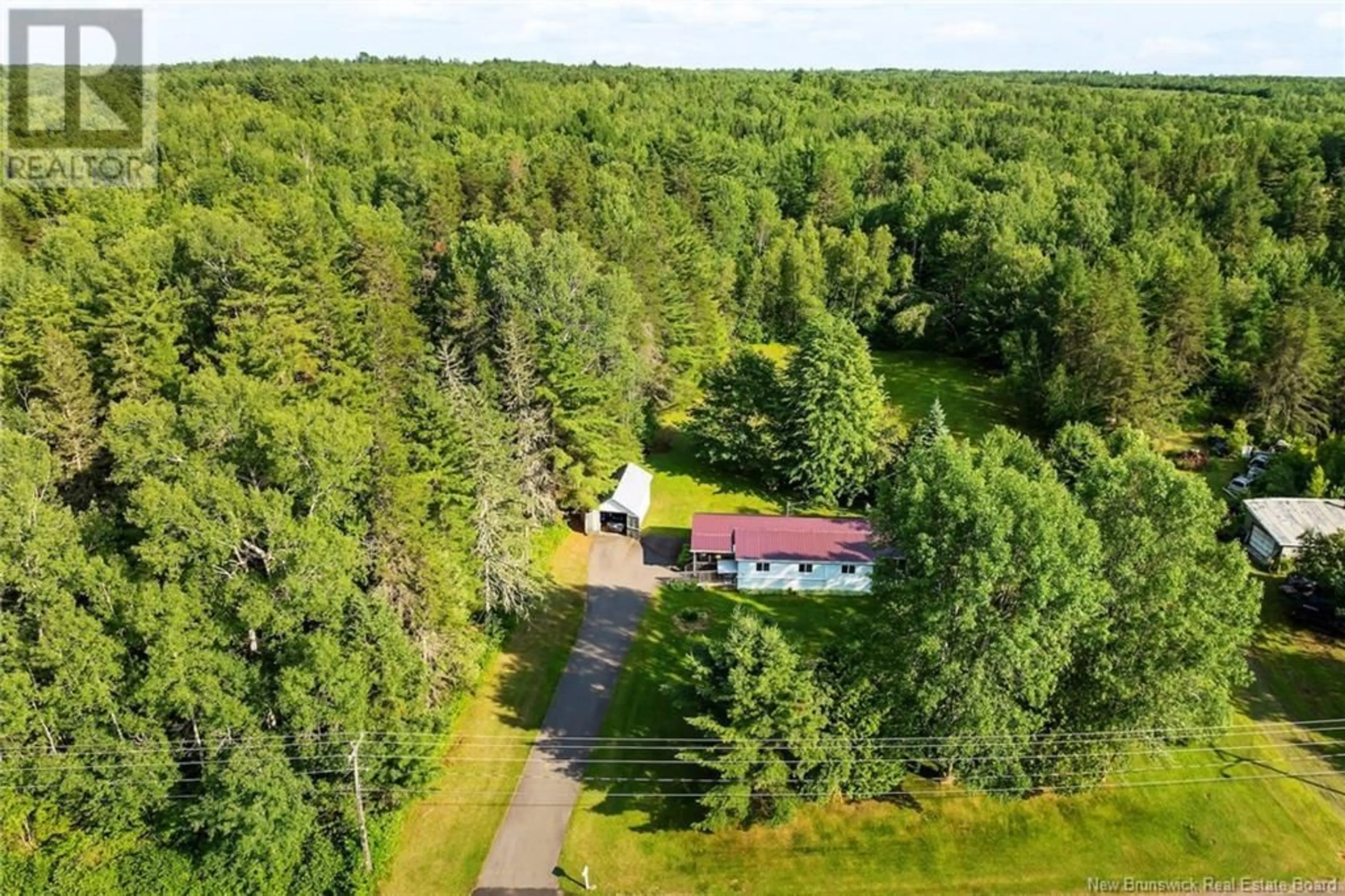 A pic from outside/outdoor area/front of a property/back of a property/a pic from drone, forest/trees view for 170 RED BANK DRIVE, Chipman New Brunswick E4A2A4