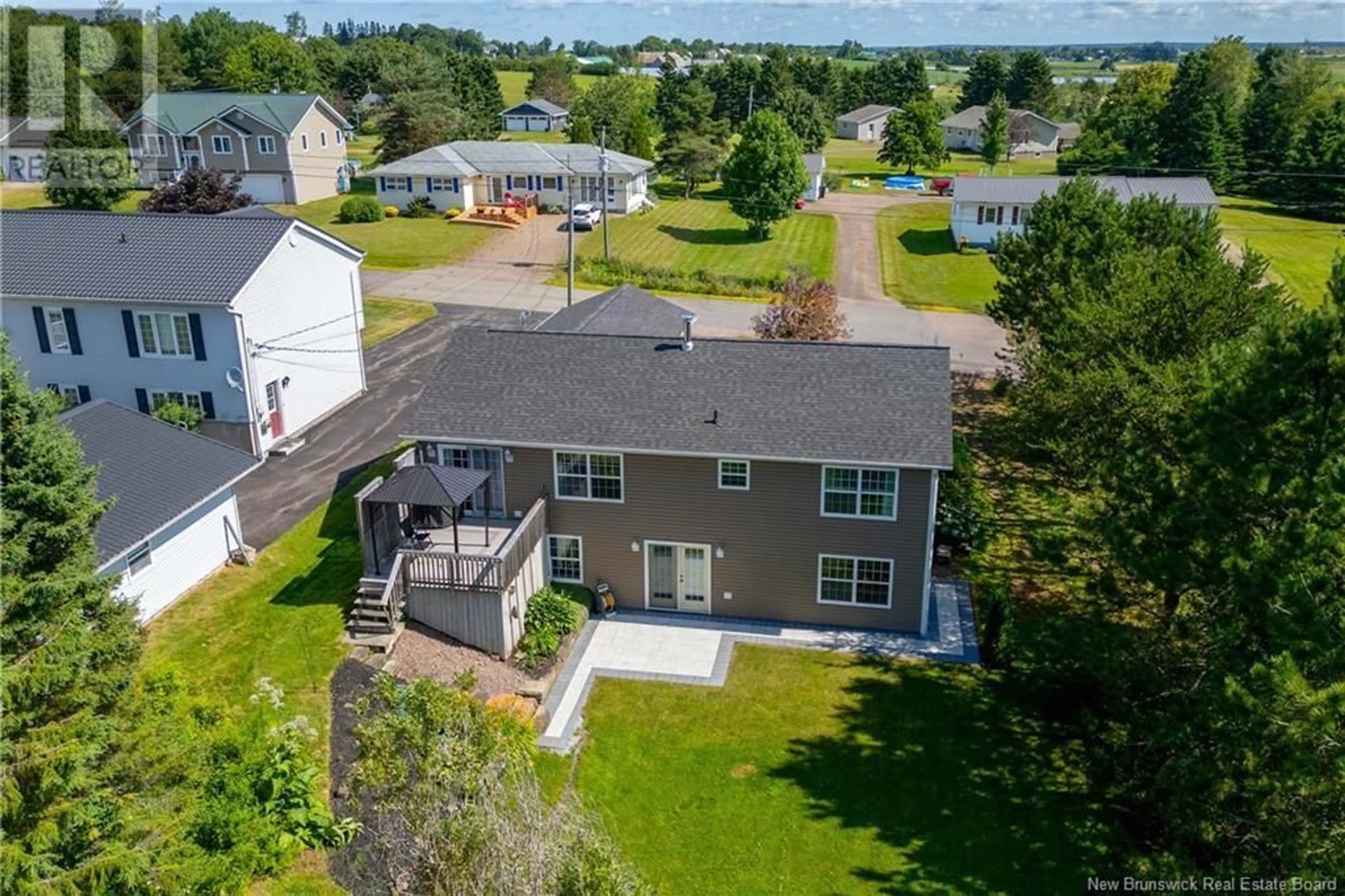 A pic from outside/outdoor area/front of a property/back of a property/a pic from drone, water/lake/river/ocean view for 29 HEDGE COURT, Sackville New Brunswick E4L3B4