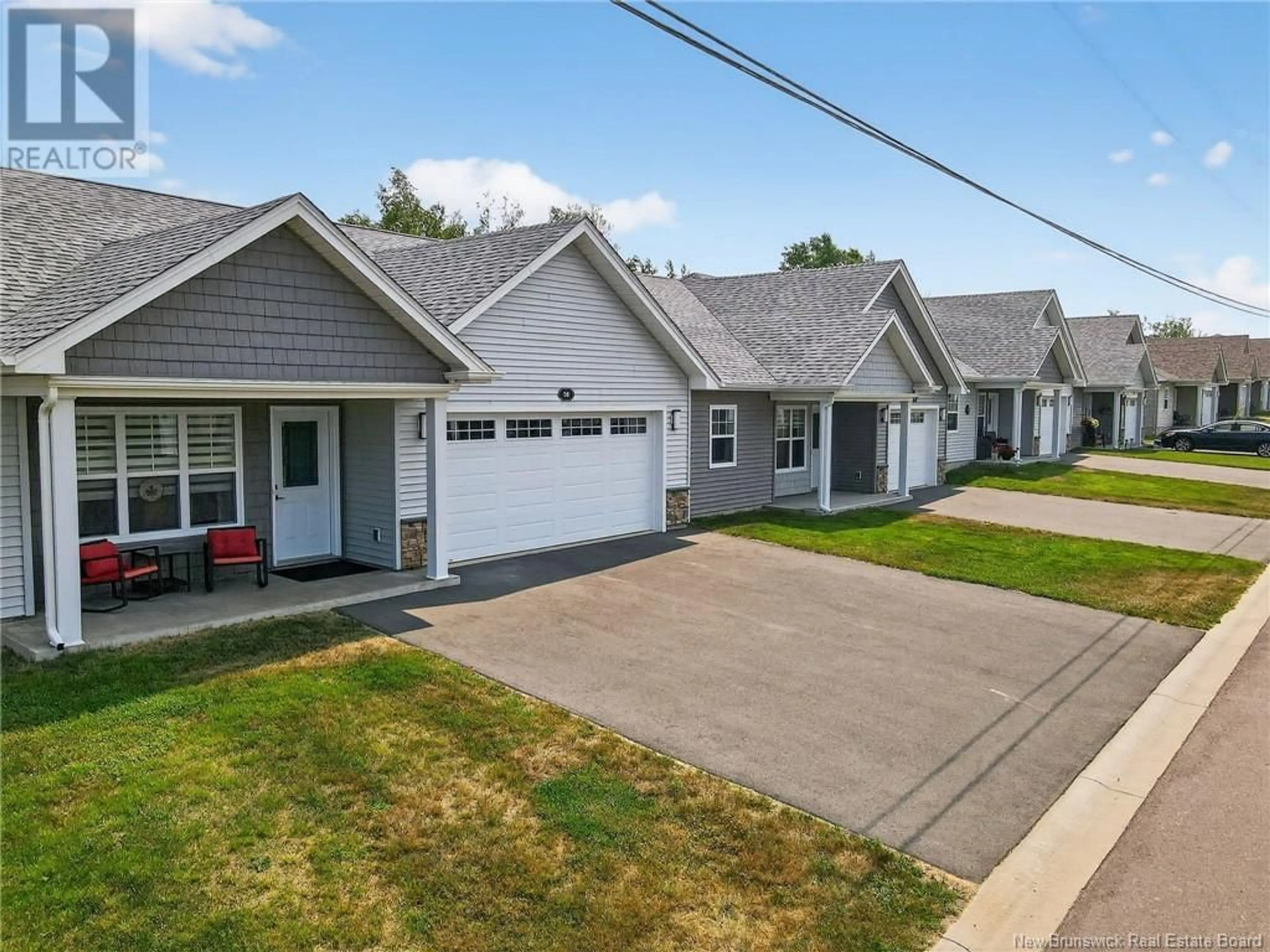 Home with vinyl exterior material, street for 38,42,46,50 JACQUES STREET, Shediac New Brunswick E4O0W5
