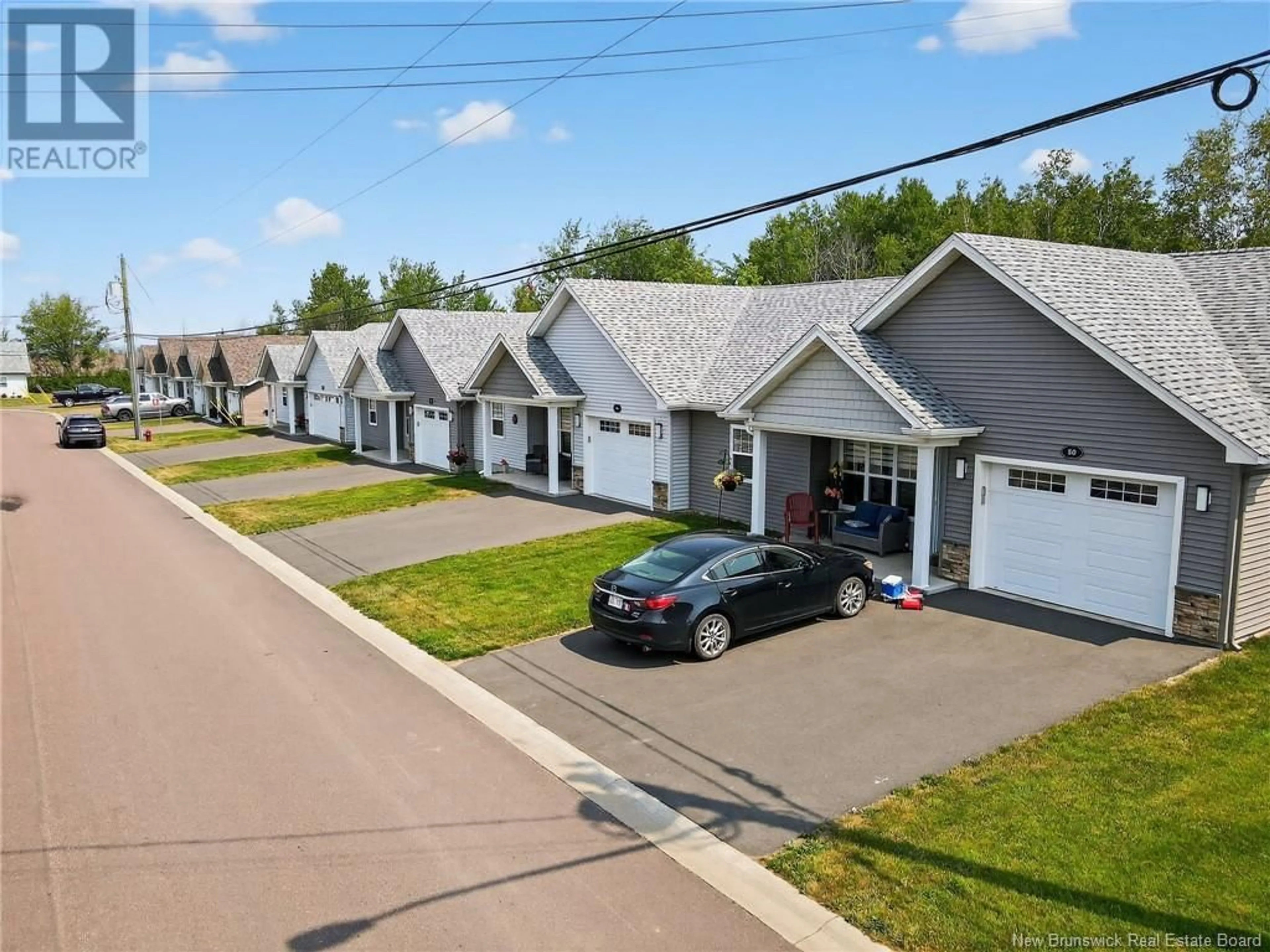 A pic from outside/outdoor area/front of a property/back of a property/a pic from drone, street for 38,42,46,50 JACQUES STREET, Shediac New Brunswick E4O0W5