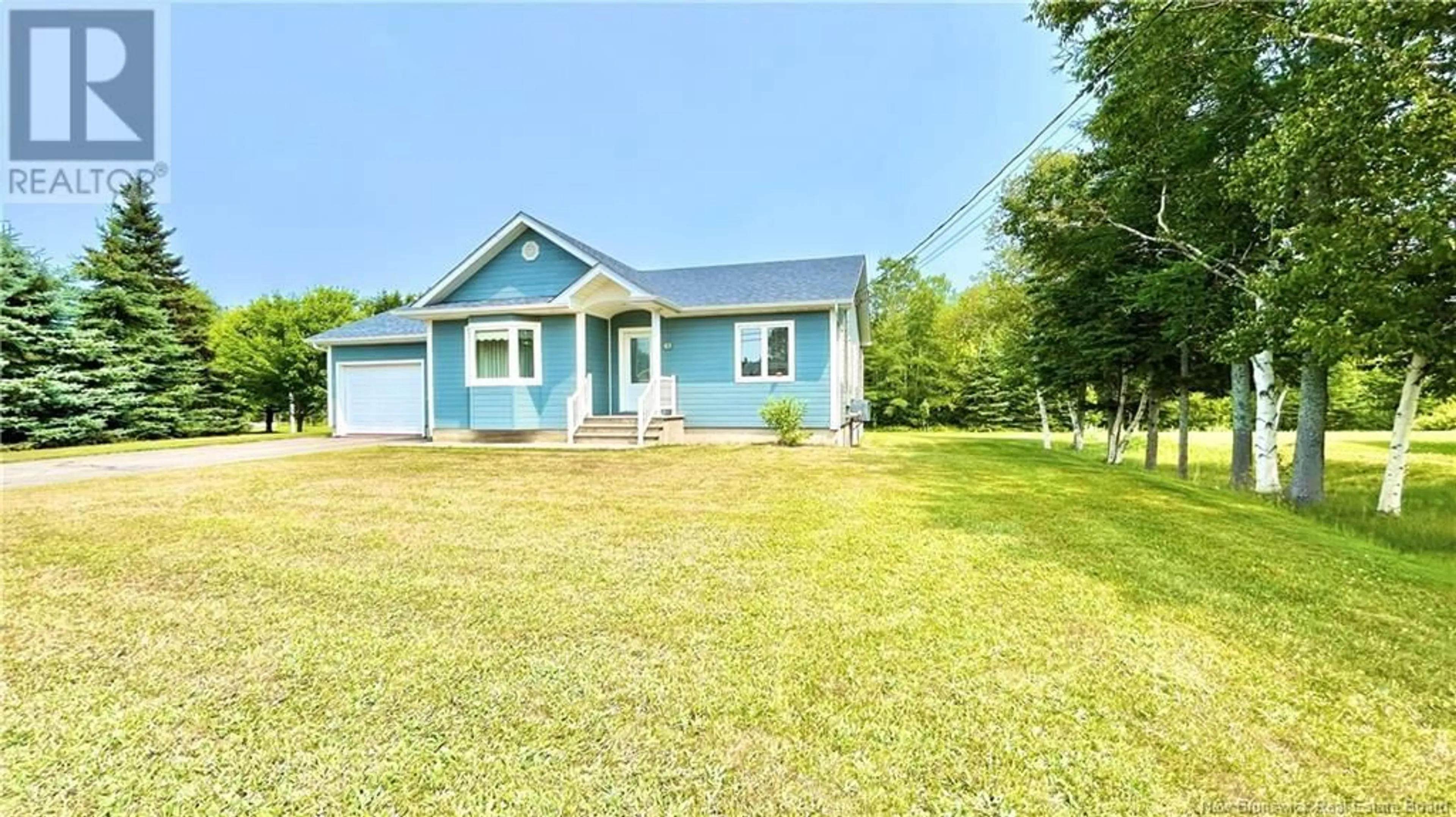 A pic from outside/outdoor area/front of a property/back of a property/a pic from drone, unknown for 61 SAINT-SIMON, Caraquet New Brunswick E1W1B3